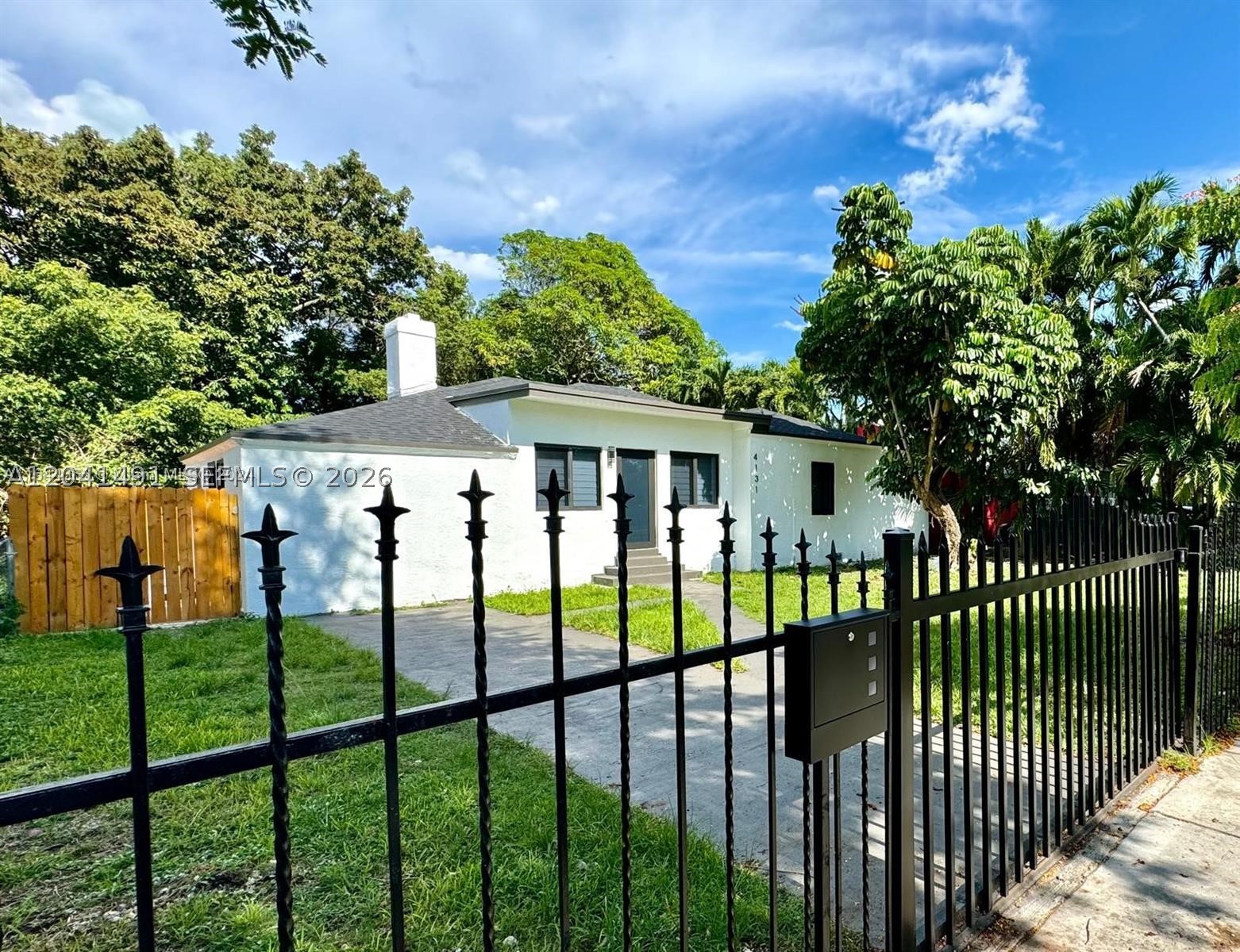 Excellent opportunity for first time home buyers or investors in Prime Miami Location! Beautifully remodeled 3/2 main house plus TWO additional 1/1 mother-in-law quarters with private entrance. Impact windows, SS appliances, huge fully fenced backyard with fruit trees. Minutes from Midtown, Wynwood & Design District. Walking distance to local amenities, schools, parks, and transit options. Easy access to highways.

Tenant occupied until June 2027. Amazing income generating opportunity.