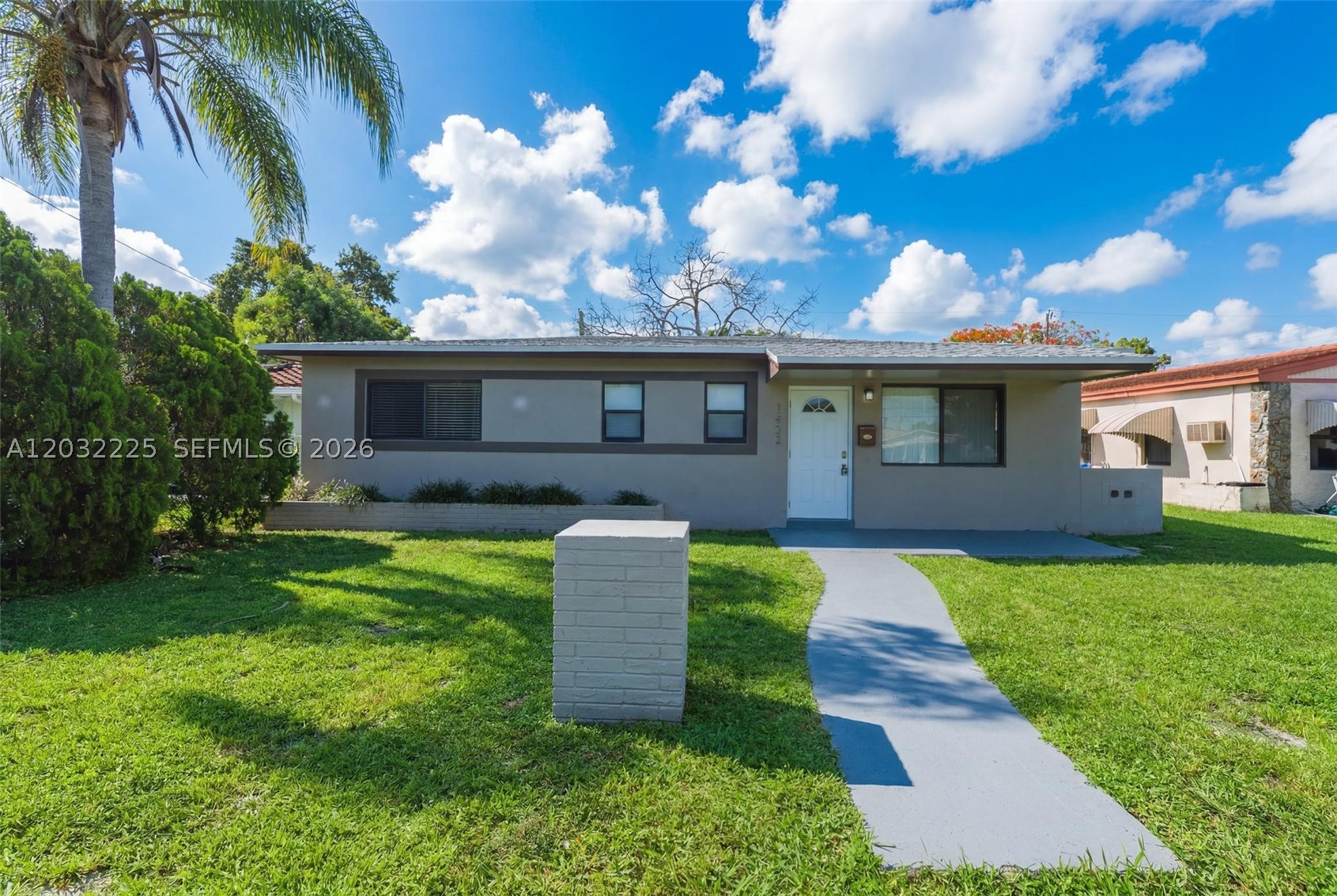 Charming bungalow in the desirable Fulford By Sea subdivision offering exceptional curb appeal and modern updates throughout. This beautifully updated home features luxury vinyl flooring, fresh interior paint, and a bright, inviting floor plan designed for comfortable living. The kitchen is equipped with stainless steel appliances, providing both style and functionality.

Enjoy outdoor living in the fully fenced backyard with a covered patio, perfect for entertaining, relaxing, or enjoying South Florida's year-round sunshine. A circular driveway provides ample parking and added convenience.

With no HOA, you'll appreciate the flexibility and freedom this property offers. Conveniently located near shopping, dining, schools, parks, and major highways, this home combines comfort, style, and outstanding value in a prime North Miami Beach location. Don't miss this opportunity to own a move-in-ready home in one of the area's most convenient neighborhoods.