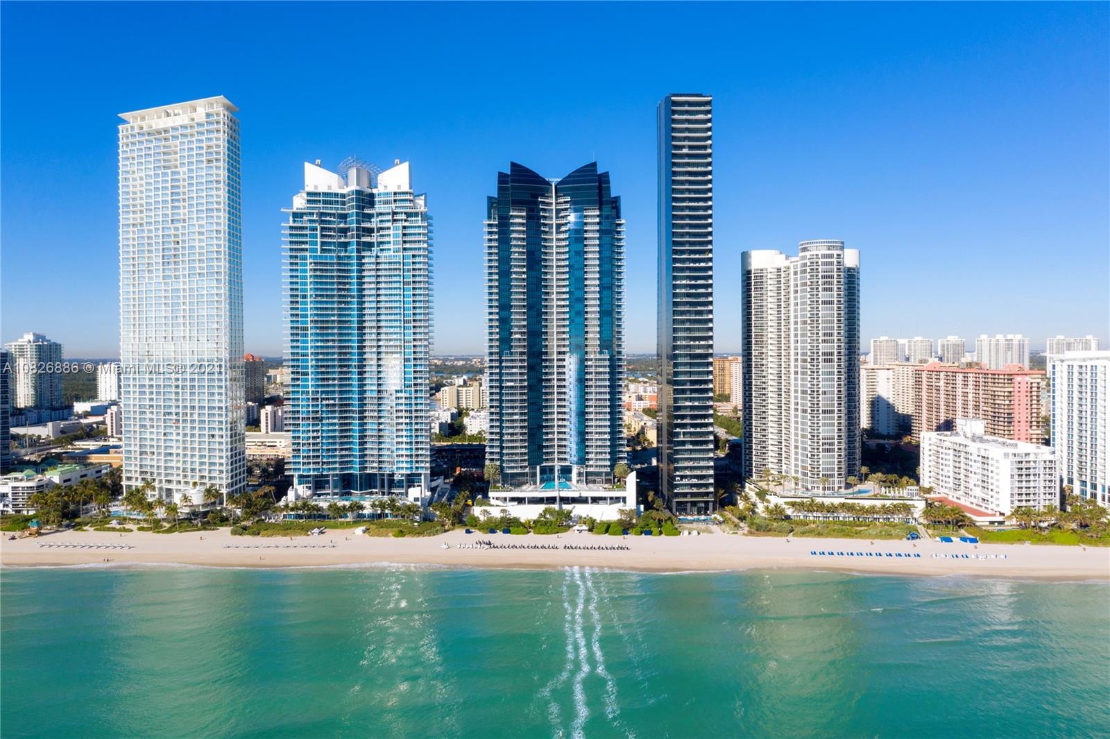 Floor to ceiling windows throughout the entire apartment so you can enjoy unobstructed direct ocean views from the combination of 2 premier units 3904 & 3905 featuring 6 bedrooms, 6 bathrooms, and 2.5 bathrooms. Inspiring flow-through floor plan, marble floors and appointed with the finest finishes and furnished with luxury and contemporary pieces. Elegant white kitchen with stainless steel appliances. Each room has their own terrace overlooking the ocean. Jade Ocean was designed by famous architect Carlos Ott with phenomenal finishes and offers fully staffed amenities such as beach service, cafe, sunrise & sunset pools, wellness & fitness center, kid’s playroom, business center & in-home touch screen that allows residents to request concierge, valet, dining & spa services.