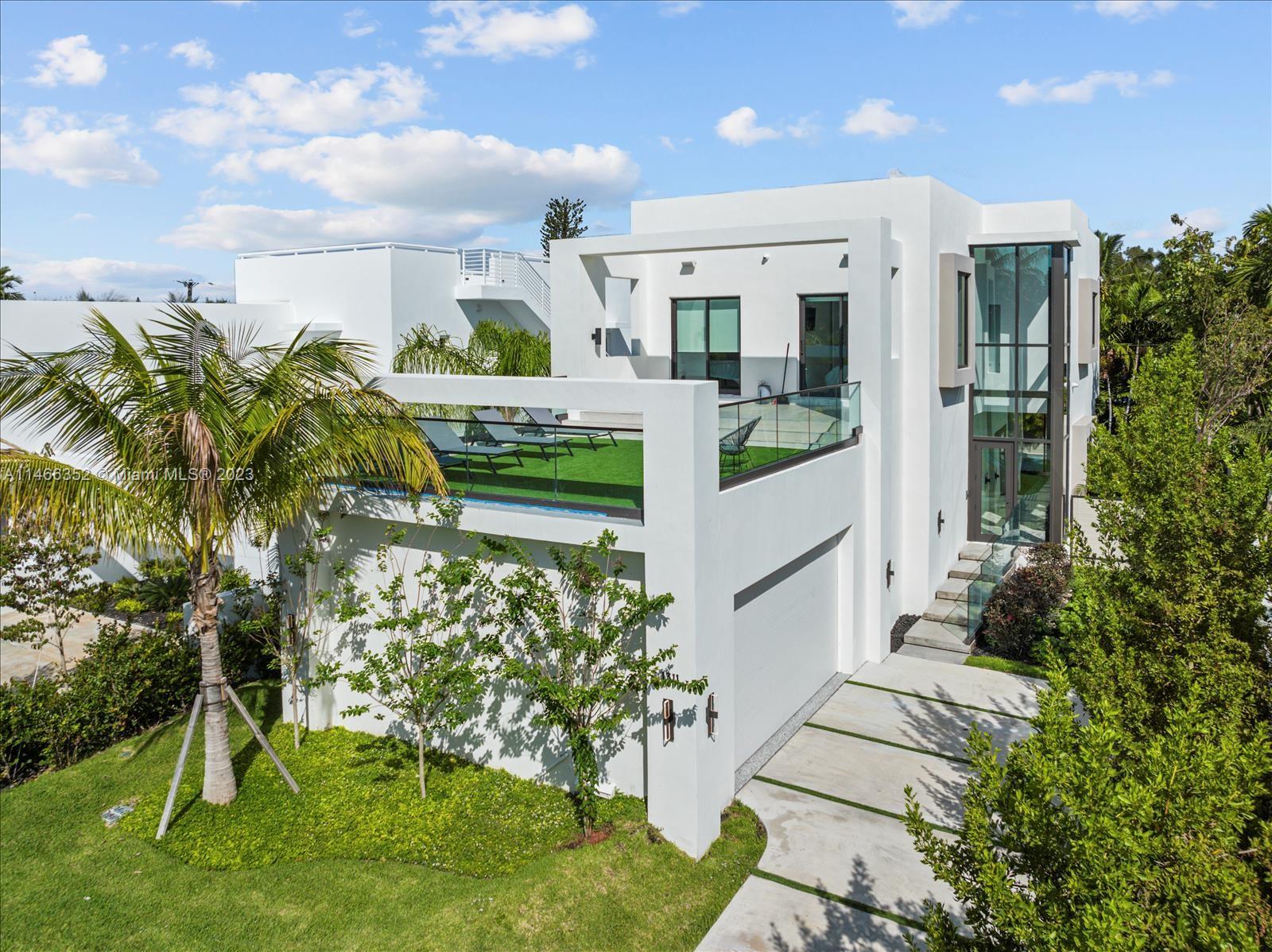 FURNISHED NEW CONSTRUCTION FOR RENT, Miami Beach masterpiece nestled on prestigious Bay Dr. No expenses spared, with 5 beds & 5.5 baths of seamless living, spread across 2 stories. Loaded w/energy efficient & sustainable features such as high elevation, double-pane impact windows, high-efficiency AC, LED lighting, induction cooktop & more. This fully automated smart home has state of the art security, technology & finishes including: Sonos indoor-outdoor entertainment, security & surveillance, Bosch appliances, Italian doors & kitchen by Nobilia. An entertainer's dream home with expansive terrace on 2nd level. Fully furnished allowing for turnkey experience, just bring your toothbrush!