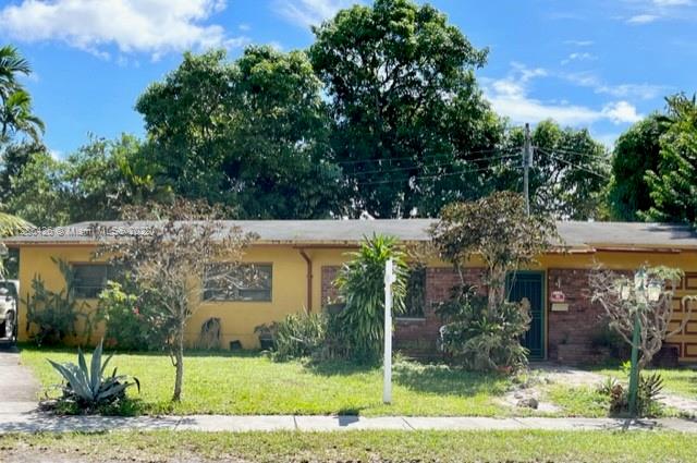 This 3 bedroom 2 bathroom single family home features a huge one car garage, fenced back yard and a family room/den. Centrally located near parks, schools I-95, US-441, and the Gratigny Expy. Property is sold as is. The home is owner occupied, so please do not disturb. Showings are by appointments only, Please contact listing agent with any additional questions.