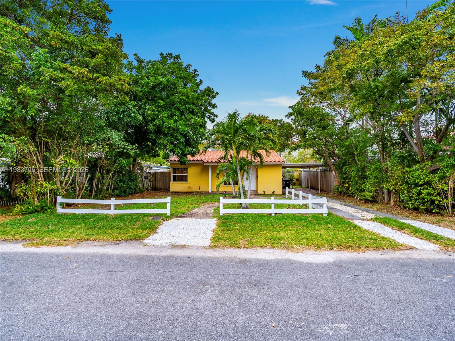 The lot is well-suited for the construction of two townhomes with no tree obstructions and is already connected to city sewer. The existing 2-bedroom, 1-bathroom bungalow is livable and can be occupied or rented while plans are worked through the city. A solid opportunity for builders, investors, or an end-user looking to settle into a great neighborhood. Located in the desirable Lake Ridge neighborhood of Fort Lauderdale, this generously sized lot sits on a quiet street with a mix of new construction and renovated homes.