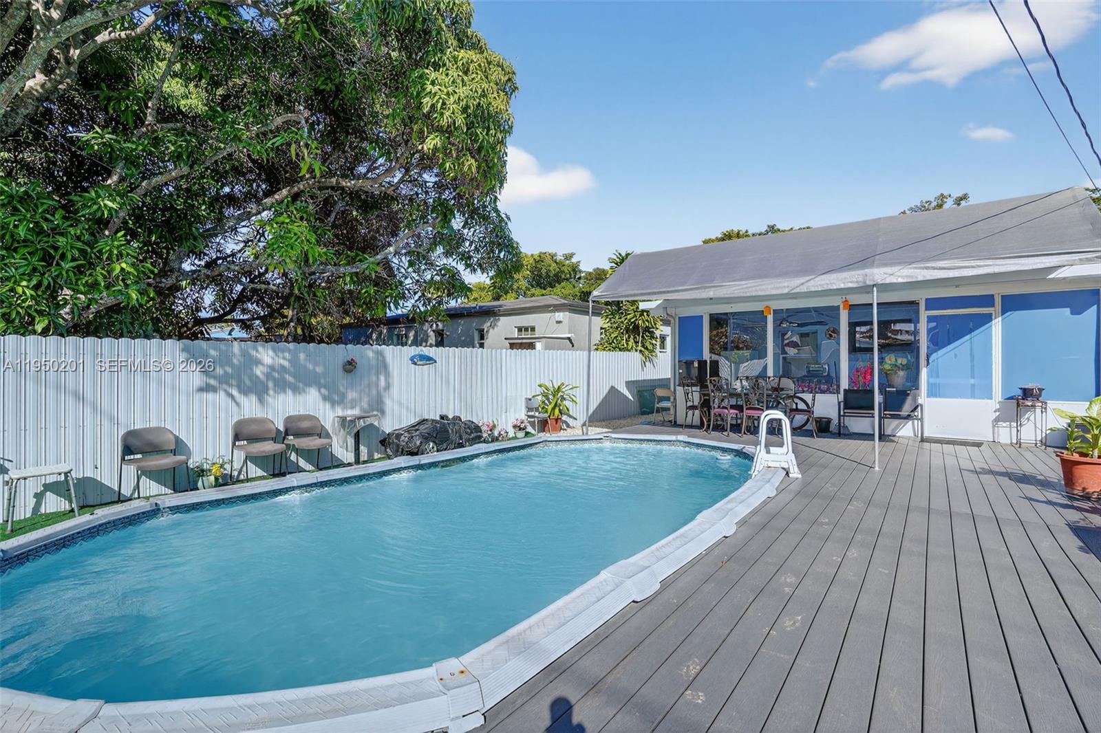 Welcome to this inviting single-family home in Opa-locka, featuring a private pool, spacious backyard, and enclosed patio—perfect for relaxing or entertaining year-round. The home offers durable tile flooring throughout in great condition, creating a clean, bright, and low-maintenance living space. Enjoy outdoor living with plenty of room for gatherings, barbeques, or quiet evenings by the pool. Conveniently located near major roads, schools, shopping, and Hard Rock Stadium this property offers comfort, functionality, and great value. A fantastic opportunity for homeowners or investors alike—schedule your showing today! Text listing agent for HD video. Light fixtures in family room and bedrooms do not convey. Seller will replace them with standard ceiling fan/light fixtures.