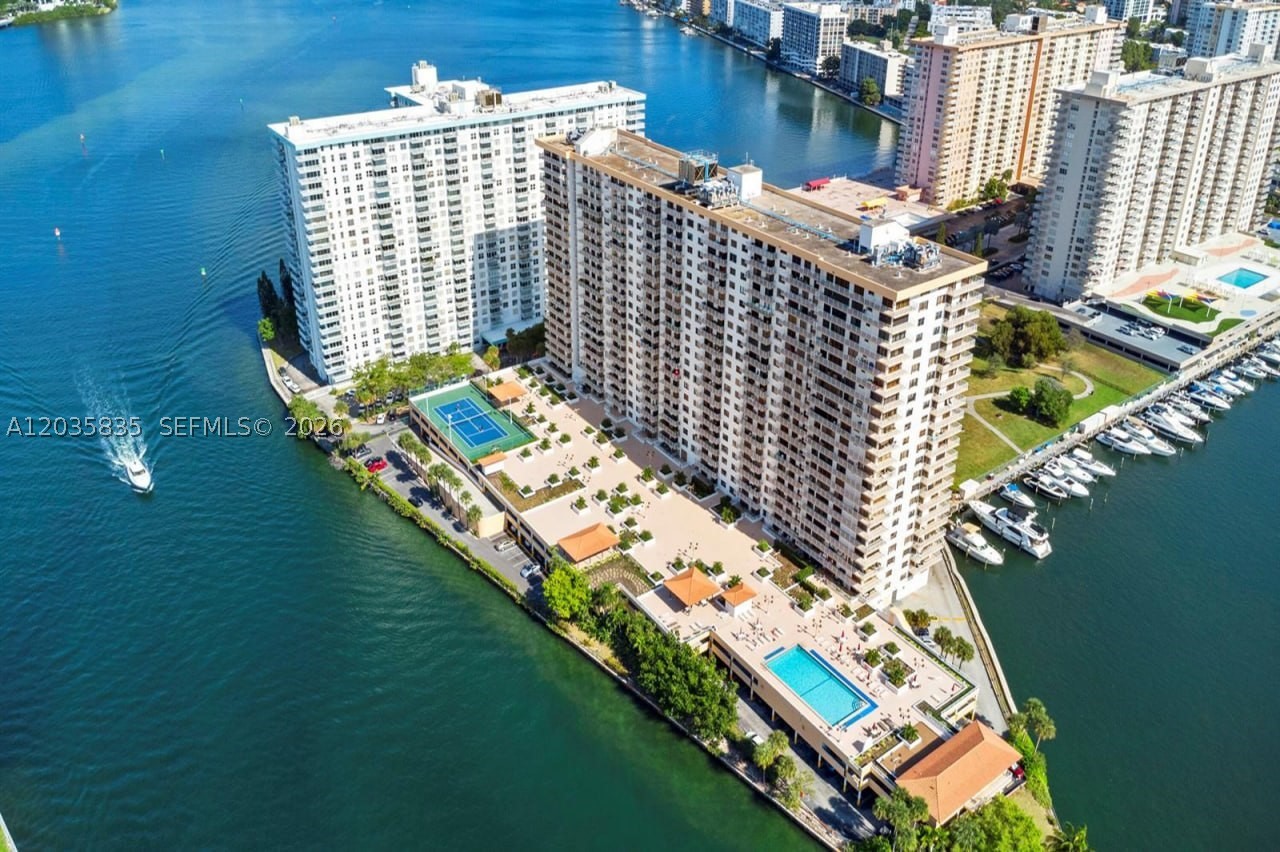 Winston Towers 700, 4th floor, East side. 1 Br/1.5 bath unfurnished condo with in-unit washer and dryer in highly desirable Sunny Isles Beach, featuring a pleasant view of the park and Intracoastal. Condo is conveniently located near the beach, 3 plazas, shops, and restaurants. Wide range of amenities, including, but not limited to: 2 gyms, sauna, steam room, tennis court, swimming pool, card room, library, ping pong, billiards, 1 garage parking space, internet, cable TV, 24/7 security, valet, front desk.