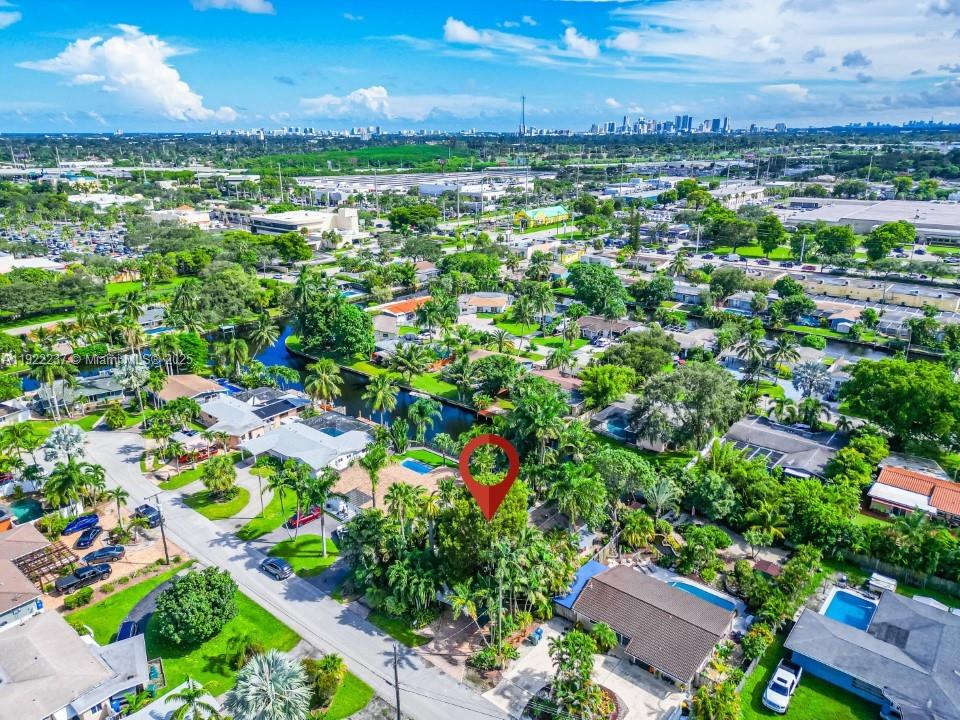 Water access Home with private dock, with an unique great style 2 bedrooms & 3er Bedroom converted into another living room. Open concept kitchen + great dinning room. 2 full bathrooms, laundry room, great backyard with a lot of tropical vegetation and a big pool with water view. Great opportunity of investment. 
Rented (do not distrurb tenants)