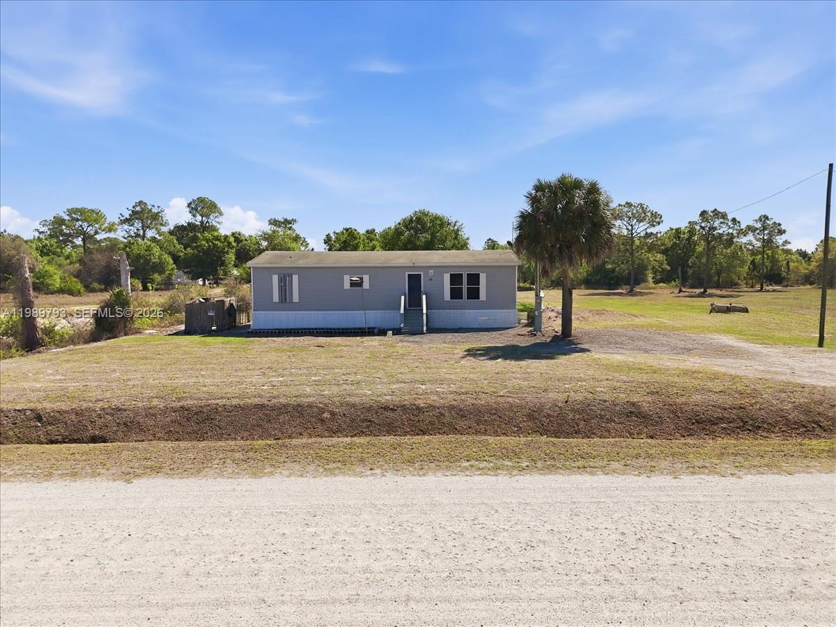 Discover comfortable living in this 3-bedroom, 2-bath home with 1,344 sq ft, set on a spacious 1.25-acre lot in Montura Ranch Estates. Enjoy a peaceful setting with plenty of room for outdoor living and flexible use. Inside features tile and laminate flooring throughout for a clean, low-maintenance interior. The kitchen offers a functional layout with stainless steel appliances, ideal for everyday living. The primary suite includes a large soaking tub, dual sinks, and a separate shower. The expansive lot provides ample space for RV, boat, or trailer parking, with room to add a pool or design your own outdoor retreat. With no HOA fees, you’ll have added freedom and flexibility. Schedule your private showing today to experience the space, privacy, and potential this property offers.
