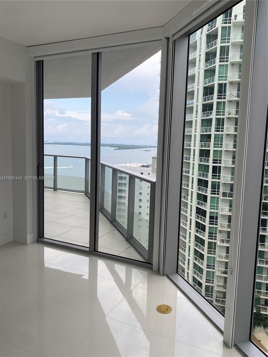 Stunning 2 Bedroom/2 Bathroom corner unit, with breathtaking direct views of the bay. Featuring modern european kitchen cabinetry, stainless steel appliances, porcelain tile floors throughout, closet cabinetry, floor to ceiling impact glass windows and sliding doors. Windows have shades and blackouts. Spacious balcony. Amenities include: A rooftop pool and sundeck with amazing water and city views, a second lap pool with cabanas, a private owner’s lounge, fitness center with top of the line machines, spa with sauna and steam room, BBQ grill and picnic area, outdoor deck with a large lounging space, theater room, children playground, 24 hr Valet and concierge, robotic parking system, and more! Perfectly situated in the heart of Brickell, within steps to world class dining, shopping and entertainment.