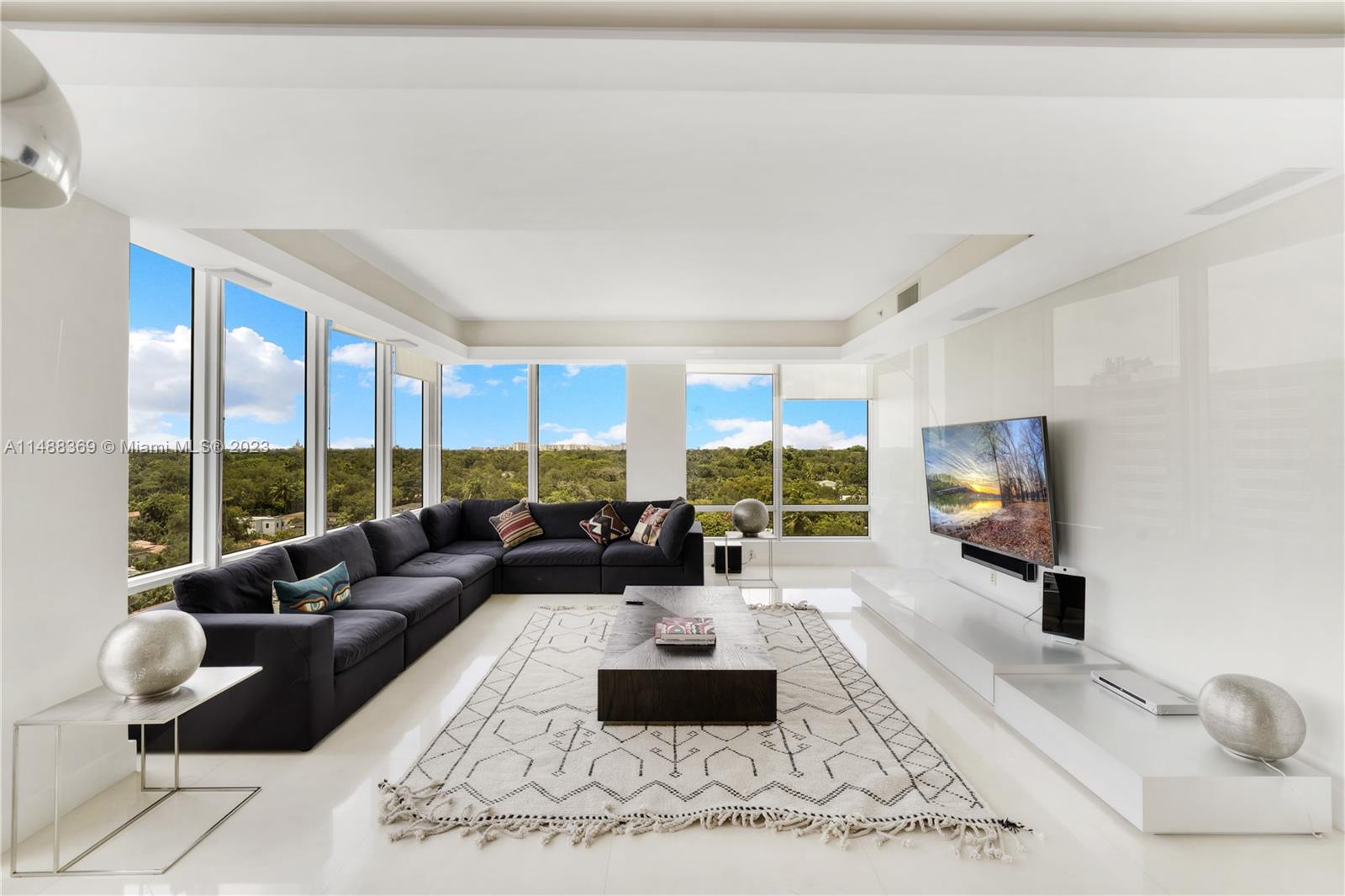 Introducing this magnificent palace in the sky, where a fully renovated kitchen stands at the centerpiece of this residence, flowing onto a sunset-facing terrace (west) and a living room with floor to ceiling windows (north). Boasting rare dual views of bayside sunrise and cityscape sunsets, the master bedroom becomes a haven of tranquility, while its bathroom impresses with dual sinks, dual commodes, and city views. Convenience is key with a combined laundry/mudroom, separate entrance for deliveries, and semi-private elevator. This gem is THE ONLY WATERFRONT condo in Coral Gables, offering 5-star amenities, 3-tier security, dedicated concierge, waterfront restaurant, beauty salon, fitness center, spa rooms, lighted Har-Tru tennis courts, marina, putting greens and a vibrant community.