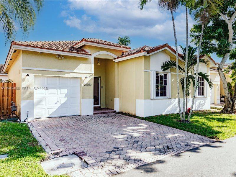 Welcome home to this beautifully updated retreat tucked away on a quiet cul-de-sac in highly desirable Cutler Bay. This move-in-ready residence showcases a bright, modern open floor plan with a split-bedroom layout designed for comfort and privacy. Sleek 24-inch tile flows throughout, complementing the updated kitchen and creating a stylish, contemporary feel. The spacious primary suite features a walk-in shower and a relaxing, spa-like atmosphere.

Step outside to a fully fenced, low-maintenance turf backyard—perfect for entertaining, pets, or simply enjoying South Florida living year-round. The home is thoughtfully equipped with accordion shutters, along with a 5-year-old A/C and water heater for added peace of mind.

Ideally located just minutes from the Turnpike, commuting is effortless. The community offers a pool, multiple parks, and scenic walking paths, enhancing an active and relaxed lifestyle. Situated in golf-cart-friendly Cutler Bay, you’re close to Black Point Marina and the highly anticipated Legacy Park, an upcoming destination for shopping, dining, and entertainment. This is modern living at its best in a vibrant and growing town—don’t miss the opportunity to make it yours.

Google & Apple Maps are misgiving in terms of exact location for 21475 - Please see Directions for correct destination