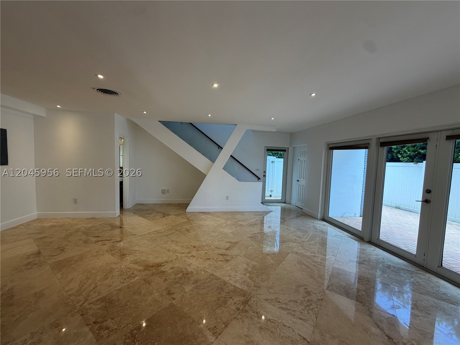 Rare fee-simple North Beach townhome with **NO HOA fees** and no association approval process. This unique 3-bedroom, 2.5-bath residence offers **1,632 SF of living area** on a deeded **1,380 SF lot** in Park View Island. Features include marble floors, remodeled interiors, blackout shades, separate laundry room, impact windows/doors, gas and electric utilities, and flexible ownership with no monthly association fee. Ideal for end-users or investors seeking a Miami Beach property with more control than a traditional condo. Located near Ocean Terrace, North Shore Park & Recreation, the beach boardwalk, free trolley, restaurants, cafés, banks, grocery/farmers market options, dog parks, and the growing North Beach redevelopment corridor. Buyer to verify all zoning, rental use, city requirements, and property details.
