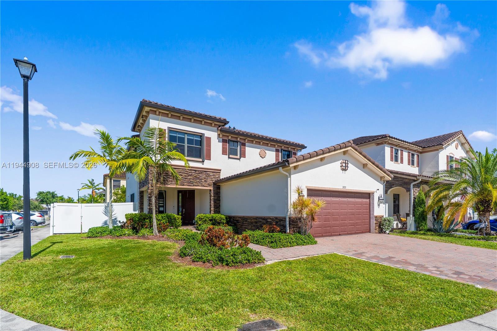 An absolute gem in gated Bonterra! Beautiful 5 bed 3 baths corner home in the exclusive community of Bonterra just minutes from Miami lakes. Home features a functional lay-out with a full bedroom and full bathroom downstairs, fully repainted interior, upgraded kitchen, beautiful tile downstairs, high quality vinyl upstairs, redone stairs, zebra and black-out blinds, upgraded scenic lighting, large primary suite, great closet space, water filtration system, HALO air purification system, and more. Exterior features pavered patio area with green area for children or adults to play, 2 car garage, new exterior fence, shutters and more! What about the community? Gated entry, pool, fitness center, basketball courts, soccer field, community park. Convenient access to the palmetto Expressway, gratingly parkway, I75 and Florida's Turnpike.  Resort-style community close to all the action this city has to offer. See it today!!! Closings costs available from full price towards buyer's buy downs and closing costs.