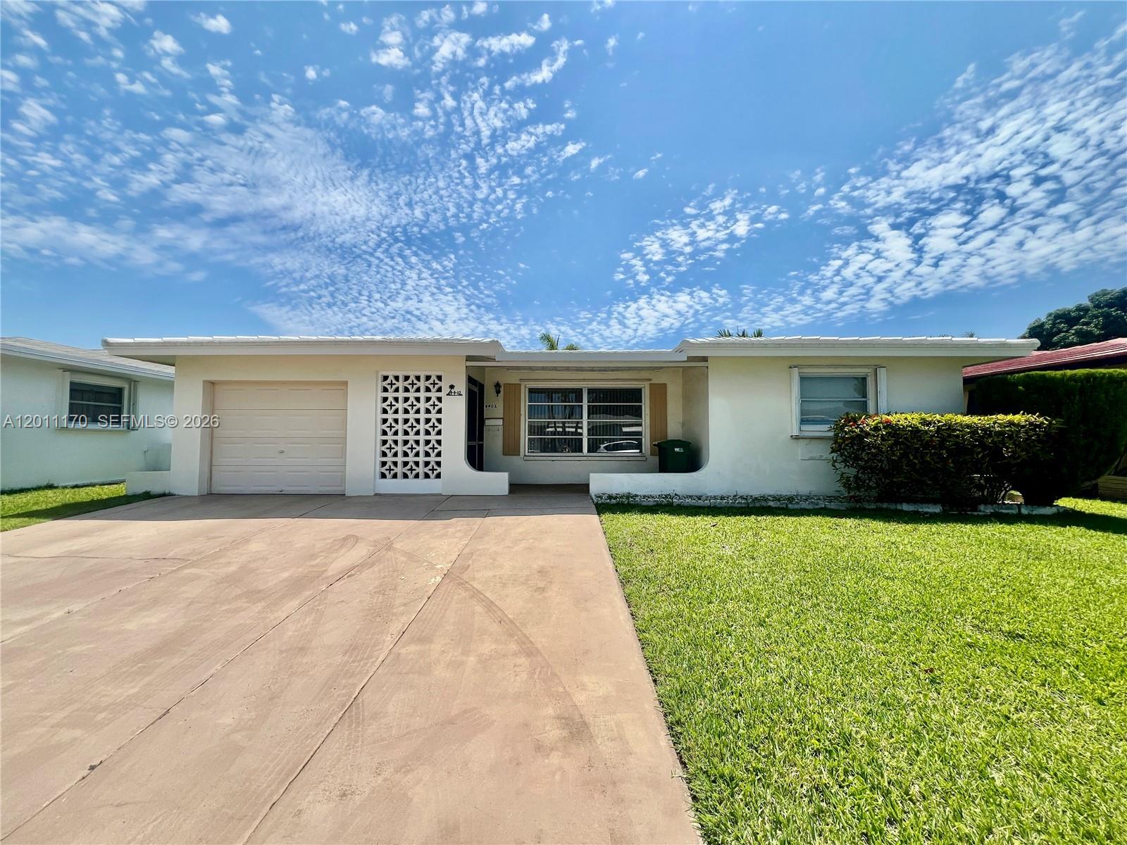 Opportunity knocks — and this one is worth answering.  
Step into one of the largest 2/2 models in the Mainlands and imagine the possibilities. This spacious home was truly loved by its previous owners, and is the perfect blank canvas for a savvy buyer who wants to customize every detail and create their ideal South Florida retreat.
Inside, you’ll find a large kitchen with a breakfast area, a comfortable living and dining space, generously sized bedrooms, a separate built-in master closet, and two full bathrooms. The home also includes a laundry area and a single-car garage with a motorized opener. The A/C is 11 years old and working well, giving you peace of mind as you plan your updates.
Re roofed with R400 rating, please see uploaded documents. 
All windows have shutters, impact doors. 
See uploaded permit history! 
Terminix plan paid for a year. 
The Mainlands Section 3 offers a fantastic clubhouse, pool, and year-round activities — a vibrant, friendly community where you’ll never be bored and never feel alone. Plus, you’re just minutes from the Turnpike, shopping, dining, and all the best of South Florida living.
This is an As-Is sale, priced with renovation in mind, and ideal for buyers who don’t want to compromise on finishes and prefer to design things their way.
Don’t miss out on this incredible opportunity to create the home you’ve always envisioned.
Please, no sight unseen offers.
