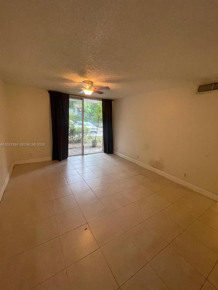 Spacious 2-bedroom, 2-bathroom first-floor condo in the sought-after Lakes of Jacaranda community in the heart of Plantation. This unit features tile flooring throughout, a well-equipped kitchen with stainless steel range, built-in microwave, dishwasher, and refrigerator with ample cabinet storage and a pantry. Both bedrooms offer generous closet space, including a walk-in closet. The unit includes a private patio and a dedicated outdoor laundry area with a stacked washer and dryer.
Residents enjoy access to resort-style amenities including two pools, a heated Jacuzzi, fitness center, lighted tennis courts, BBQ and picnic areas, a lakefront walking trail, and a clubhouse — all within a beautifully landscaped, pet-friendly community. Conveniently located minutes from I-595, I-75, the Turnpike, top-rated schools, shopping, and dining.