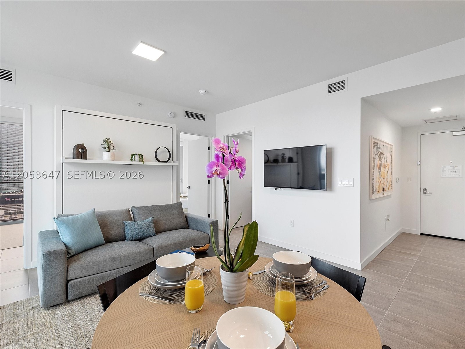 SUBLEASING IS ALLOWED! SHORT TERM RENTAL IS ALLOWED! Available seasonal/monthly. Could be rented for 1 month period! 227 NW 2nd Street Condominium is a beautiful condo located in downtown Miami. This 2 Bedroom, 1.5 Bathroom gem is situated on the 27th floor of the building and features a queen-size bed, a bunk bed, and a sofa bed. The unit is fully furnished and equipped with all accessories, including a washer/ dryer. The building offers multiple amenities such as pool, gym, restaurants, and a bar, ensuring you have everything you need at your fingertips. The building boasts a prime location just blocks away from Bayside and Kaseya Center.