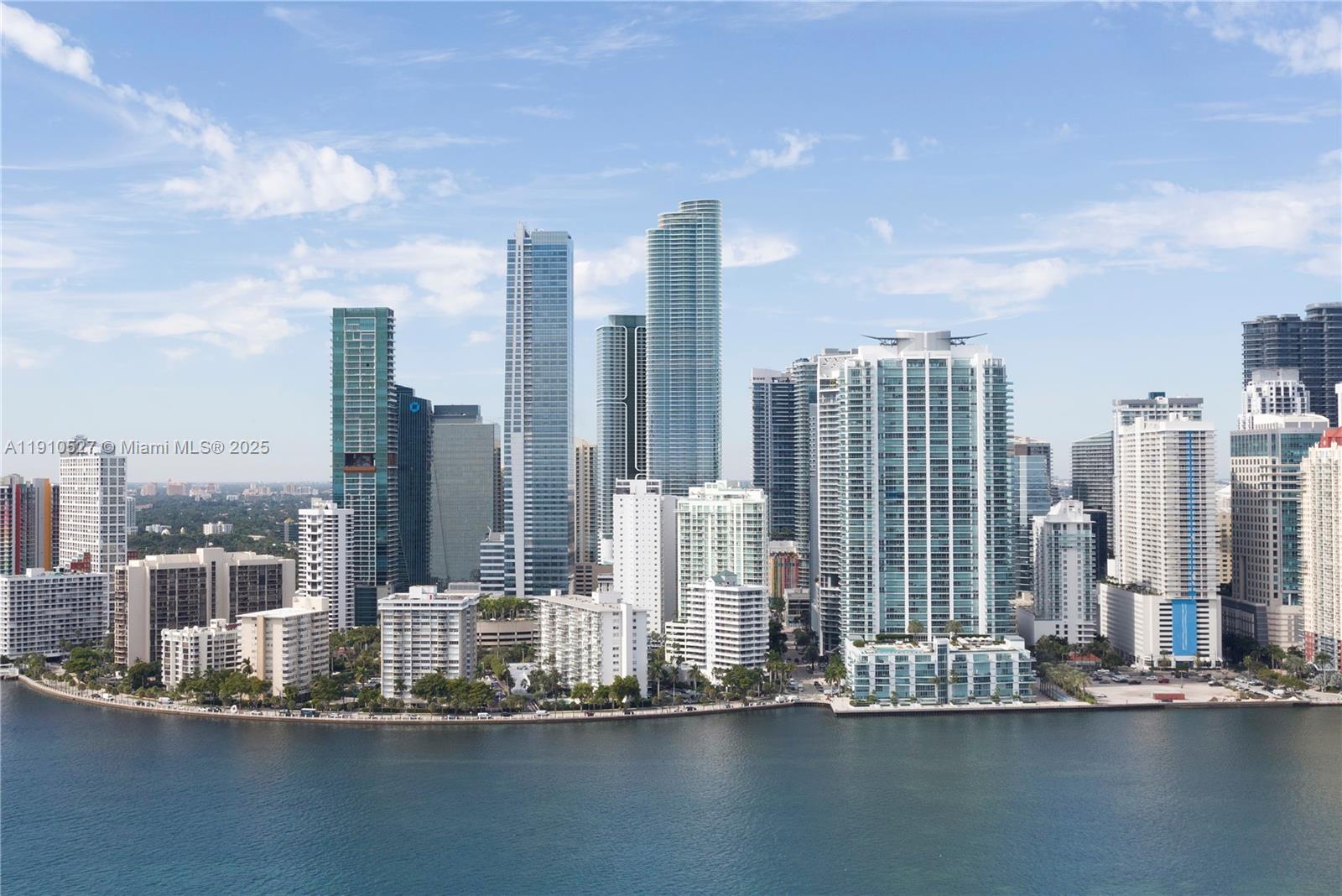 Cipriani Residences Miami redefines sophistication in the heart of Brickell. This stunning 2-bedroom, 3-bath, 2,358 sq ft residence showcases bespoke interiors with 10-foot ceilings and sweeping views of Biscayne Bay and the city skyline. Designed for modern elegance, it offers a spacious layout ideal for entertaining, featuring top-of-the-line appliances, custom cabinetry, and smart home technology. Residents enjoy access to an exquisite pool deck inspired by the Italian Riviera and Cipriani’s legendary 24-hour dining and hospitality services, including private in-home dining and an exclusive indoor-outdoor restaurant and bar.
