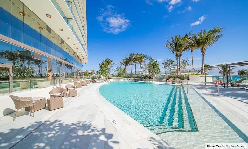 Welcome to luxury living at Armani/Casa Residences Sunny Isles Beach. This beautifully unfurnished 2-bedroom, 2.5-bath residence offers a private elevator entry, spacious open-concept living areas, floor-to-ceiling glass, and an expansive terrace with stunning ocean and city views.

The residence features a gourmet kitchen with premium appliances, custom cabinetry, elegant finishes, and a spacious primary suite with a spa-like bathroom and generous walk-in closets. Move-in ready and impeccably maintained, it offers the perfect blend of comfort, style, and sophistication.

Enjoy five-star amenities including beach service, oceanfront pool, fitness center, spa, restaurant, wine lounge, movie theater, children's playroom, concierge, valet, and 24-hour security.

Ideally located in the heart of Sunny Isles Beach, just minutes from Bal Harbour Shops, Aventura Mall, and world-class dining. Available for annual lease at $13,000 per month.