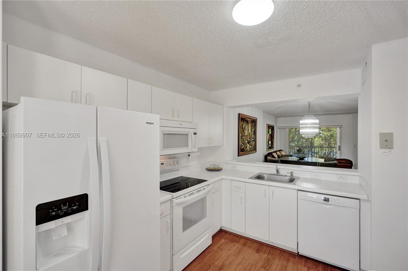 Welcome to WELDON at Kings Point, one of Tamarac's most vibrant 55+ gated communities! This well-appointed 2-bedroom, 1-bath condo offers 980 sq ft of comfortable living space with a lovely garden view and a smart, functional layout. The unit features a brand-new AC, in-unit washer and dryer, closet cabinetry, and updated appliances including refrigerator, electric range, microwave, disposal, and electric water heater. Located on the 3rd floor of an elevator building with plenty guest parking.
Kings Point is truly resort-style living,  residents enjoy a manned gate, Performing Arts Theater, Social Club, heated pool, gym, tennis courts, and a community shuttle bus that keeps everything within easy reach. The monthly maintenance fee covers ALL amenities, building exterior, elevator, insurance, pool service, reserve fund, sewer, trash removal, and water, making this an exceptionally low-maintenance lifestyle.
No lease first year of ownership. Minimum 360-day lease thereafter. Association approval required (3–4 weeks). Application fee $150. Minimum 650 credit score and $24K annual income required. Tax reflects no homestead exemption.