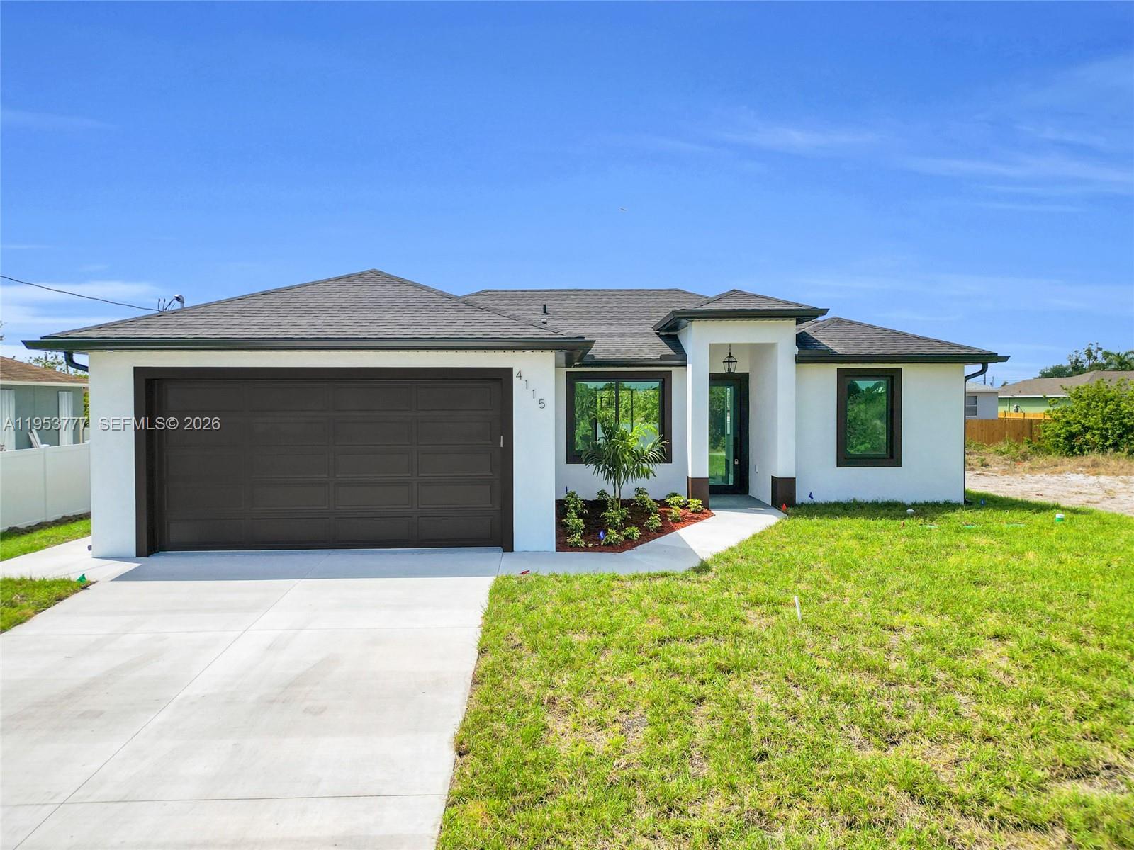 Gorgeous New Construction Home!!! Three bed, two bath, two car garage, calacatta quartz counters tops in kitchen and baths, new stainless steel appliances, impact resistant doors and windows with Energy System Low-E, keeping your home comfortable year-round while saving energy costs. This beautiful home has a great open concept with imported porcelain tile throughout, sprinkler system, epoxy floor in the garage and much more... Easy access to Fort Myers, 10 minutes to RSW International Airport, shops, restaurants, schools, etc... Make your offer today!!!