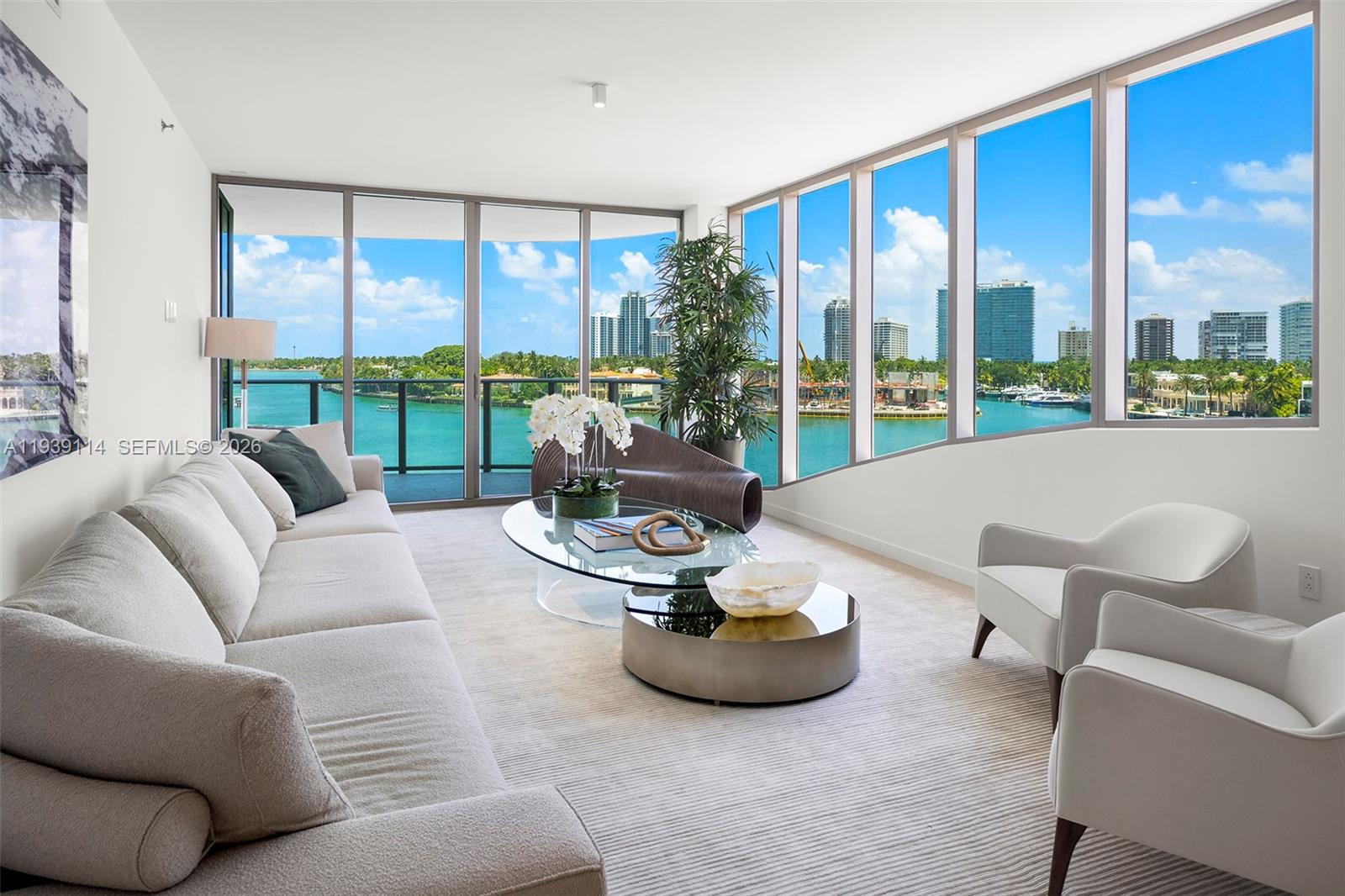 Step into this stunning corner unit at Onda, Bay Harbor's premier luxury building by Arquitectonica. 3, 523 SF under air, 469 SF of balconies, 4 beds, 4.5 baths plus den, with a flow-through floorplan and floor-to-ceiling windows flooding the space with natural light. Private elevator entry. Walking distance to Bal Harbour Shops, the beach, and Pura Vida. Snaidero kitchen with marble countertops and premium Miele appliances. Rooftop pool, gym, spa, EV chargers, 2 parking spaces, storage, and 24-hour valet. Close boat access to the ocean from the Intracoastal. $500K Artefacto furniture available for $300K. 45-foot boat slip available for purchase at $500, 000. Privacy, Italian design, luxury, private boat slip in a boutique building close to everything ? This is your best option in Miami.