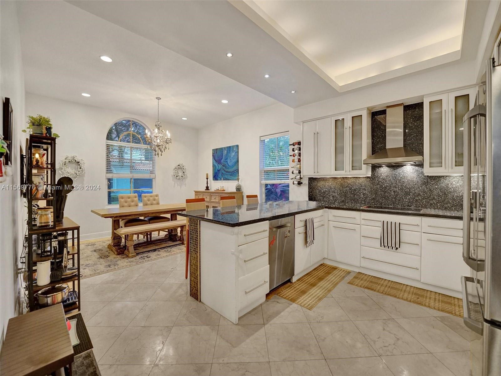 Amazing Opportunity!! 5 min from the beach. The prestigious gated community of Harbor Islands( MARINA) - Oversized Lot  6,639 with private pool - Attractive model, 2-story home, Spacious Master Suite on ground level - 3 bedrooms, 2.5 bathrooms, master bathroom jacuzzi tub and split shower. Family room, den & 2-car garage. Features include Marble and wood floors, impact windows, a pool heat system, an extended driveway, a laundry room, and an opened den on the second floor. The large backyard features a beautiful artificial turf and patio area, perfect for entertaining. FEES INCLUDE LAWN AND POOL MAINTENANCE. Amenities: on-site health spa, marina, tennis court. Minutes to the beach, restaurants, and stores. Can ride bicycles to the beach. BOAT SLIPS ARE AVAILABLE 25FT-120FT