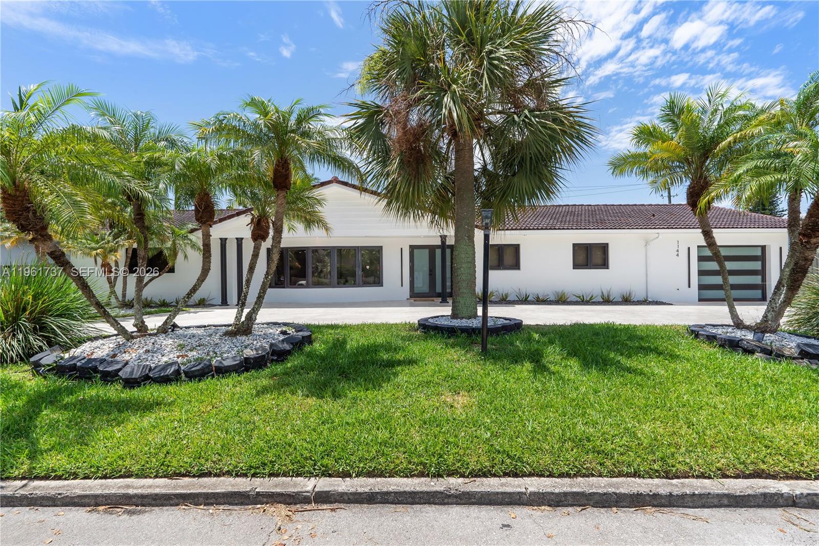 Embrace the epitome of luxury in this expansive 6-bedroom, 5-bathroom haven located in sought-after Hollywood Beach, FL. Boasting an oversized pool and abundant entertainment space, including a sauna, this home is designed for hosting memorable gatherings. The recently remodeled kitchen features brand new appliances, complemented by a new roof with a 40+ year warranty, upgraded front and garage doors, and impact sliding doors throughout—all windows are impact-resistant, ensuring peace of mind and energy efficiency. New A/C system and a whole-house water filter, enhancing comfort and convenience. Close to Sinagoga, ocean, FLL airport, Aventura Mall, and Miami Beach
