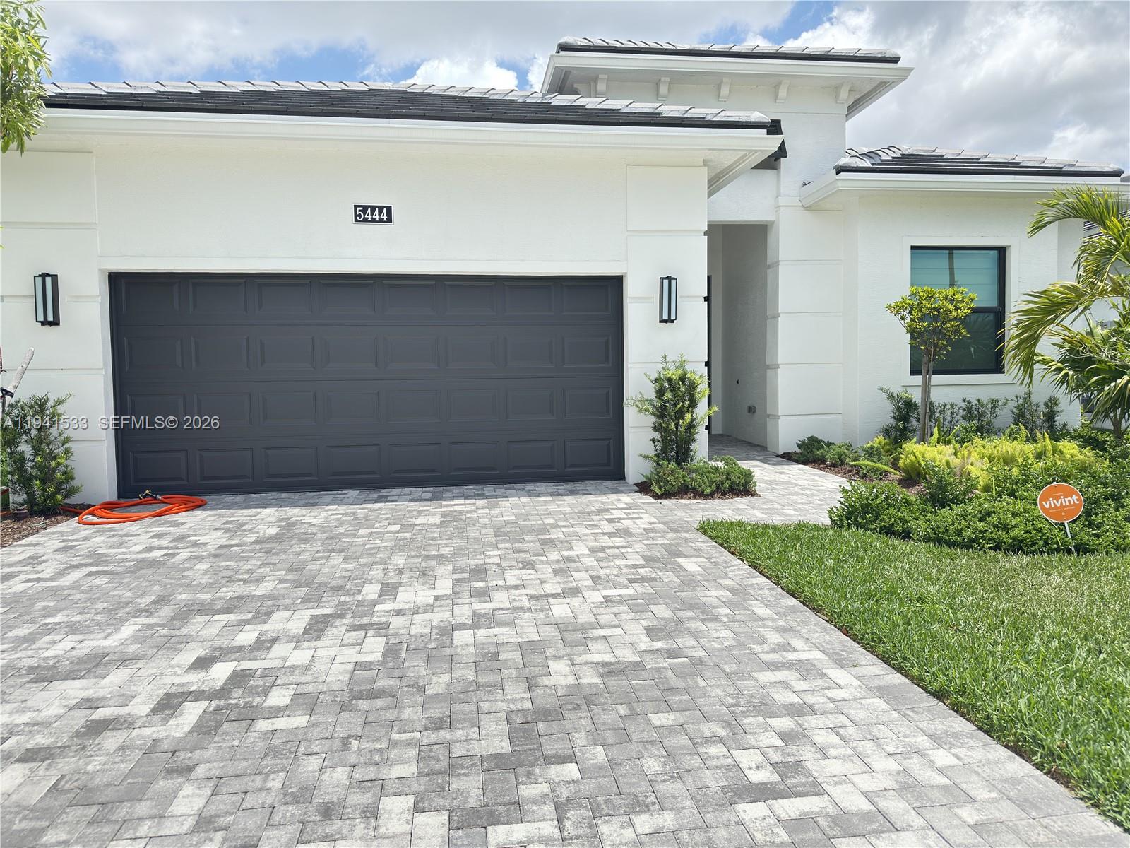 Luxury living in a resort-style community! Upgraded Luxurious Dania Model home with over $200K in upgrades, EXTENDED LENAI, EXTENDED KITCHEN (Casual Dining) with cabinets to the ceiling, custom wood closets, and motorized blackout shades. on 2-Car Garage in Stunning Westlake! Located in the highly sought-after Cresswind community within Palm Beach County's newest city, Westlake, this Model offers 3 bedrooms, 3 bathrooms, a versatile club room that can easily serve as a fourth bedroom, Wine cellar, dedicated working den or/office--perfectly designed for both luxury and everyday living. includes yard maintenance, offering a care-free lifestyle. Conveniently located near beaches and three international airports. Enjoy exclusive access to Westlake Adventure Park with resort pools, fitness center, pickleball, tennis, and walking trails. Children 18 and under are restricted.
Move-in ready and priced to sell WestLakeForSale.come with a private, oversized lot, the home showcases a gourmet kitchen with a dramatic waterfall-edge quartz island, upgraded GE Monogram stainless steel appliances, pull-out cabinet shelves, a butler's pantry, dry bar with LED lighting, ideal for entertaining in style.