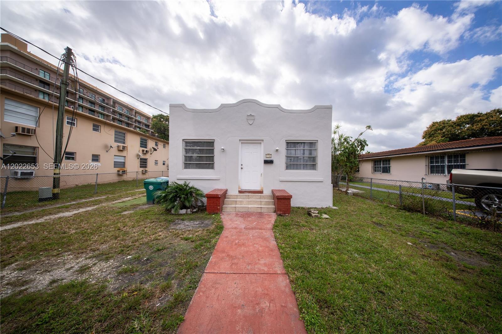 Rare income-producing duplex in the heart of Miami’s desirable Shenandoah neighborhood! This charming 1925-built property sits on a generous 7,000 sq ft lot and offers two separate units totaling 1,563 sq ft. The front unit is rented rear unit occupied, providing immediate cash flow from day one. Wood floors, central air, and 2 parking spaces. Just minutes from Downtown Miami, Brickell, and Coral Gables. Zoned T3O zoning permits modern multi-unit or townhome construction with strong upside potential — live in one unit and rent the other or hold as a pure investment. Cash and conventional financing welcome. Don’t miss this opportunity in one of Miami’s most sought-after corridors!