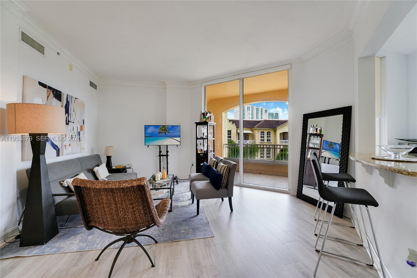 Bright 2-bedroom, 2-bath residence at the sought-after Alaqua in Aventura. This well-appointed unit features high ceilings, an open layout filled with natural light, and a modern kitchen with granite countertops and stainless steel appliances. The primary suite offers a generous walk-in closet and a private bath. Enjoy a private balcony, in-unit washer/dryer, and two covered parking spaces. Alaqua provides resort-style amenities including a pool, fitness center, marina, clubhouse, and 24-hour security. Prime location near Aventura Mall, dining, top-rated schools, and beaches. Houses of worship within walking distance.