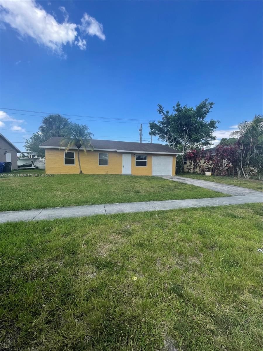 Come see this 3 bed 2 bath home with 1 car garage. It's open floor plan features 32" kitchen cabinets with granite counter tops, SS appliances, neutral tile throughout home, ceiling fans in all bedrooms, impact windows, large laundry room with new washer & dryer and a spacious fenced back yard. Rent also includes lawn care & AC replacement filters.  Minimum credit score of 620.  No Pets. No Smoking.
Prospective tenants may apply using the included RentSpree.