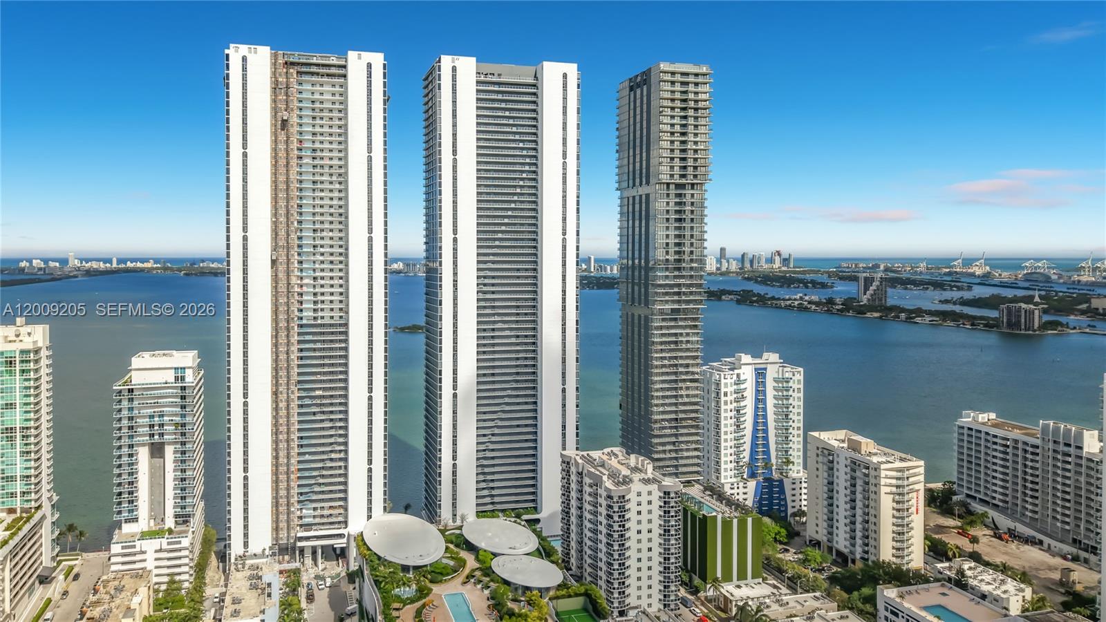 Experience elevated waterfront living in the prestigious South Tower at Aria Reserve Miami. This beautifully designed 49th floor 1-bedroom + den, 2-bath residence offers a spacious, functional layout with a versatile den ideal for a home office or guest space. Floor-to-ceiling glass fills the home with natural light, complemented by sleek finishes and modern design. A private elevator that opens directly into your exclusive foyer. Enjoy resort-style amenities, lush landscaping, and breathtaking bay views in one of Miami’s most sought-after new developments. Perfectly positioned at the heart of Miami,  5 minutes to Wynwood/Design District/Midtown/Downtown Miami/Brickell, 8 minutes to Miami Beach, 15 minutes to Miami International Airport. See Broker Remarks