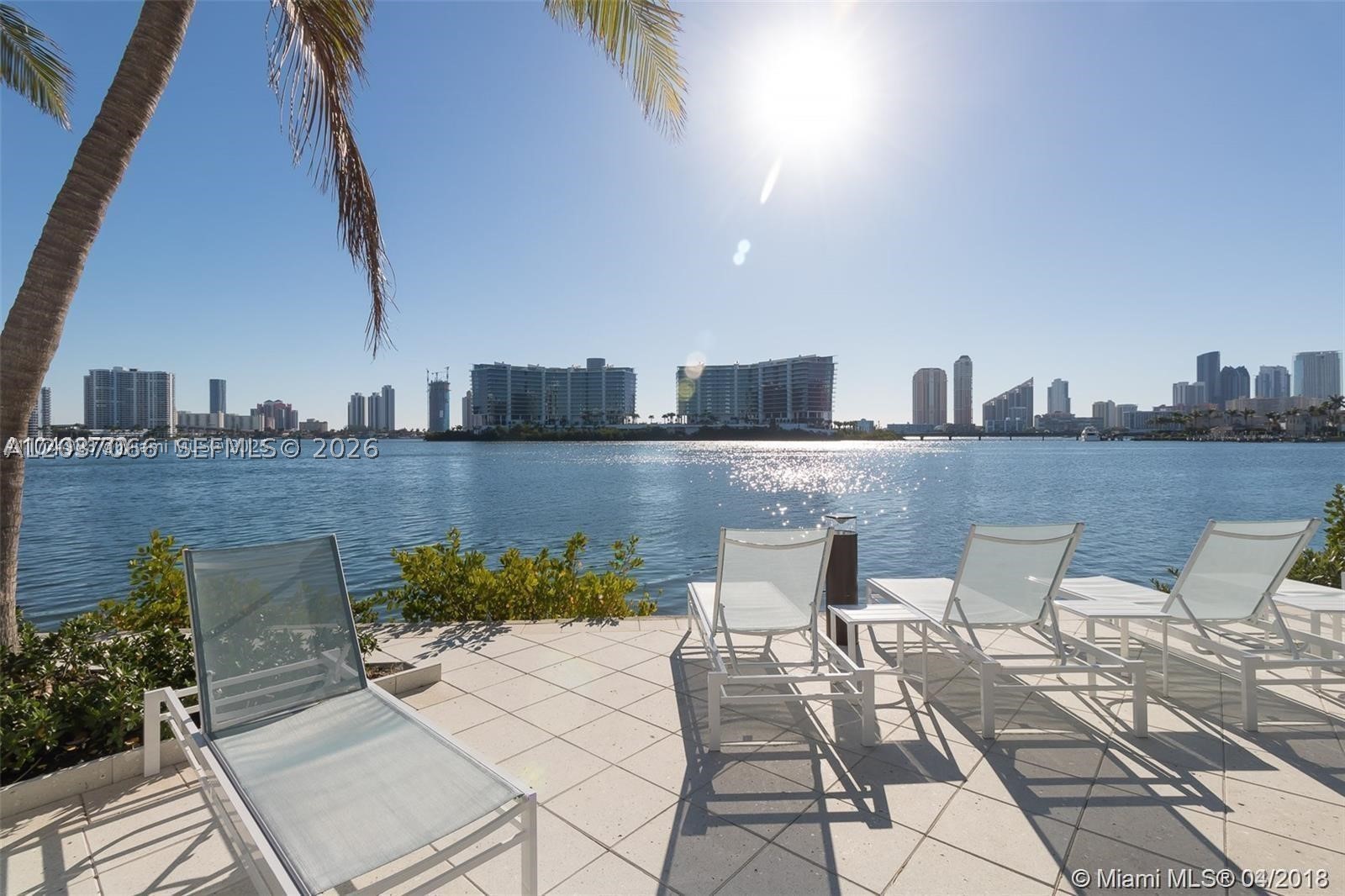 RESORT STYLE LIVING IN THE HEART OF AVENTURA. BEAUTIFUL WATERFRONT COMMUNITY SURROUNDED BY LUSH LANDSCAPING. LARGE 1 BEDROOM 1 BATH, APPROX 900 SQ FT.,  UPGRADED, TILE FLOORS, UPGRADED LIGHTING WASHER/DRYER IN UNIT., LARGE OPEN STYLE KITCHEN. PRIVATE GARDEN PATIO. NEW A/C & WATER HEATER., ASSIGNED GARAGE PARKING, (CLOSE TO UNIT IN GARAGE) ABUNDANCE OF GUEST PARKING IF ADD'L PARKING NEEDED. RENT INCLUDES , WATER, CABLE/INTERNETASSIGNED PARKING, WITH AN ABUNDANCE OF GUEST SPACES, GREAT AMENITIES: BAYVIEW POOL & JACUZZI, FITNESS CENTER, COMMUNITY EV CHARGING PORTS AVAILABLE!  CLUBHOUSE, PARTYROOM, THEATRE, TENNIS COURTS, BARBECUE PAVILLION, A+ SCHOOLS, CLOSE TO AVENTURA MALL, PUBLIX, SHOPPING, GREAT FAMILY COMMUNITY *see broker remarks