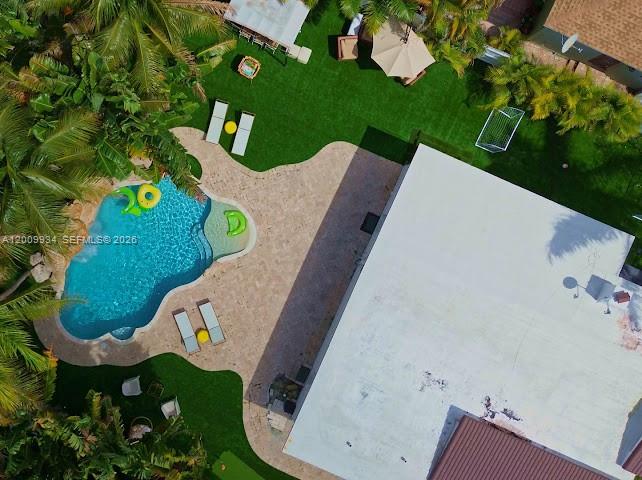 Just minutes from the beach, this 4-bedroom 'smart home' comfortably accommodates up to 10 guests and features a private pool, outdoor entertainment areas, and spacious living spaces designed for relaxation and hosting. Ideally located only 2 minutes from Downtown Hollywood, 5 minutes from the beach and 2 minutes from the boat ramp, the property offers easy access to dining, shopping, and local attractions. Currently operating as short time rental, the home holds a 5-star rating across major rental platforms including Airbnb, VRBO, etc. reflecting its strong reputation and guest satisfaction, with earnings reaching up to $19,000 per month. This property is fully licensed and certified for short-term rentals by the City of Hollywood, with all taxes and permits up to date, making it a turnkey, compliant, and sustainable investment opportunity. The property can be sold fully furnished at an additional price for buyers interested in continuing operations seamlessly as a short-term rental business.