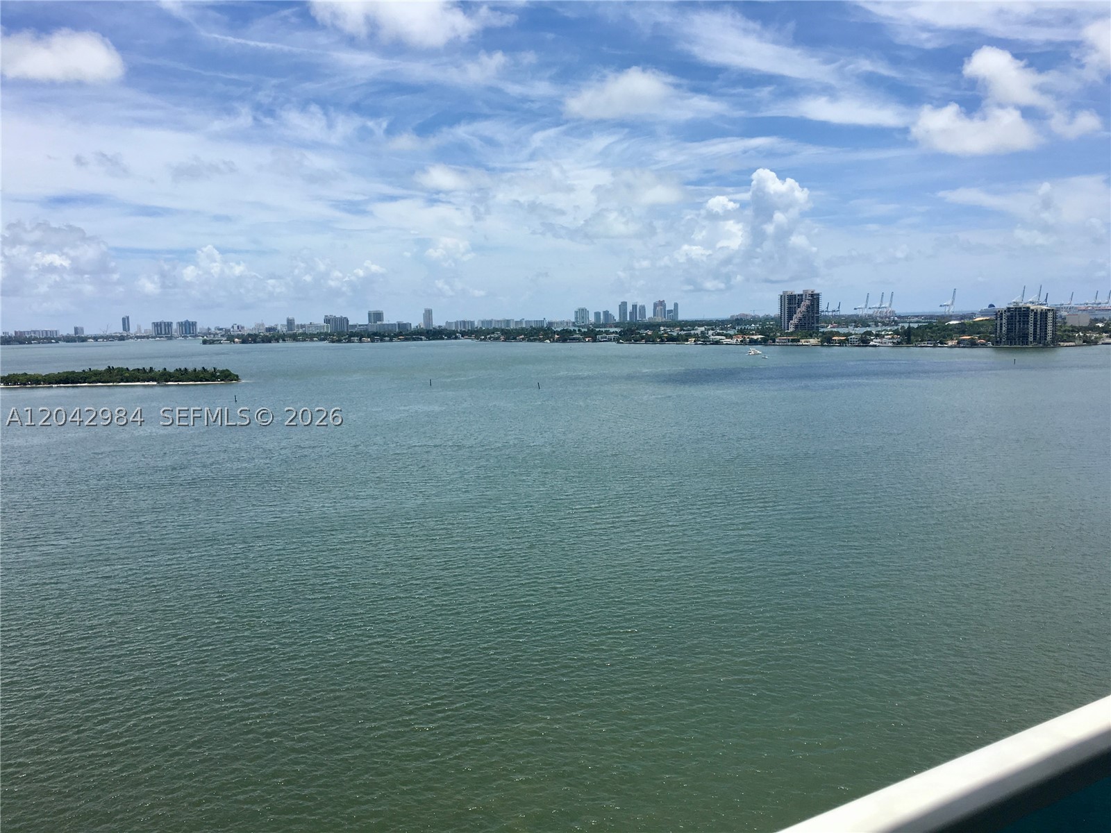 Own a view that can never be replicated at this price point. This exceptional 1-bedroom residence at New Wave Condominium offers breathtaking, direct, unobstructed views of Biscayne Bay that today command multi-million-dollar premiums in neighboring Edgewater towers. Designed by acclaimed architect Kobi Karp, this residence features high ceilings, beautiful wood floors, custom-built closets, electric shades, and an oversized private terrace that feels more like an outdoor living room overlooking the bay. Located in the heart of Edgewater, one of Miami’s most desirable waterfront neighborhoods, New Wave offers resort-style amenities including a waterfront lap pool, fitness center with cardio and strength-training equipment, meditation garden, resident lounge with water views, 24-hour concierge, 24-hour security, secured entry, valet parking, and one covered parking space included with the unit. Enjoy an unbeatable location directly across from Margaret Pace Park with tennis, basketball, and volleyball courts, while being just minutes from the Miami Design District, Wynwood, Downtown Miami, Brickell, and Miami Beach. A rare opportunity to own a true waterfront retreat with forever views in one of Miami’s most vibrant locations.