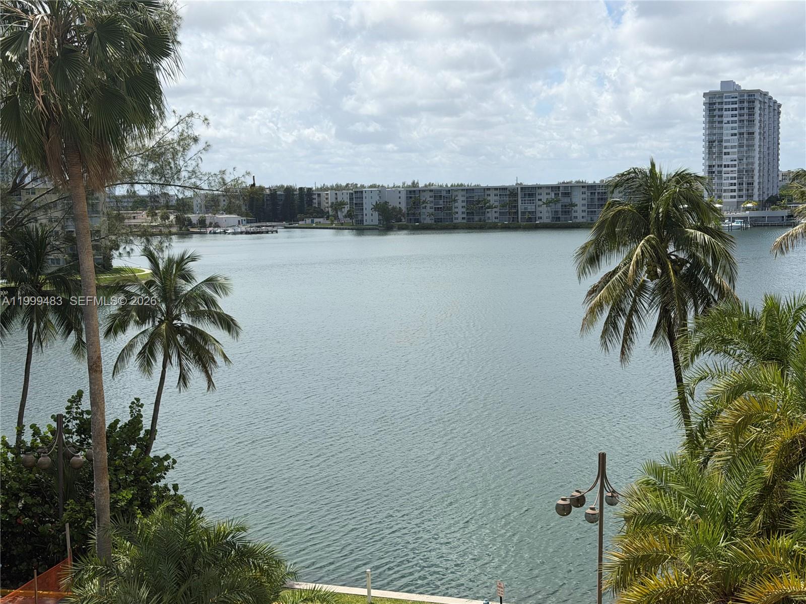 Centrally located high-floor one-bedroom, one-and-a-half-bath with an expansive layout and sweeping intercoastal-bay views. Bright, airy living spaces showcase floor-to-ceiling windows that frame water vistas and flood the residence with natural light. The generous bedroom offers privacy and storage; the half bath provides guest convenience while the full bath delivers comfort and function. Large balcony with direct water views. Full-service building with exceptional amenities including 24/7 concierge/valet, fitness center, pool, spa, resident lounges, and secure parking. Ideal for buyers seeking a turnkey, view-driven retreat in a prime, central location — schedule your private showing today.
