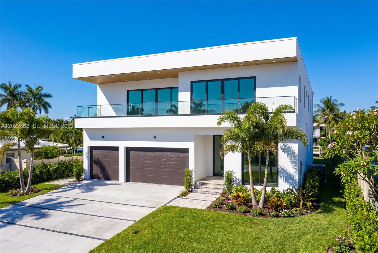 Brand-new waterfront construction in the exclusive gated community of Bal Harbour, designed for the ultimate South Florida lifestyle. Set on a 9,000 SF lot with 87 feet on the Middle River, a true natural waterway, this pre-completion residence offers luxury, flexibility, and room for all the toys. Featuring 4 oversized en-suite bedrooms, expansive open living spaces, expansive chef's kitchen with an 11ft Island, and an additional upstairs lounge, the home is designed for effortless entertaining and comfortable everyday living, all with beautiful water views throughout. The oversized 3-car garage offers ceiling height for vehicle lifts (potentially accommodating up to 6 cars and all your toys), plus additional space for an RV, boat trailer, golf carts, and more. Enjoy your private pool, dock, and seawall with direct boating access—perfect for sandbar days, waterfront dining, and sunset cruises. Located just minutes from the beach, yacht clubs, shopping, and dining, this is the ideal home for those who want luxury living with an active waterfront lifestyle.