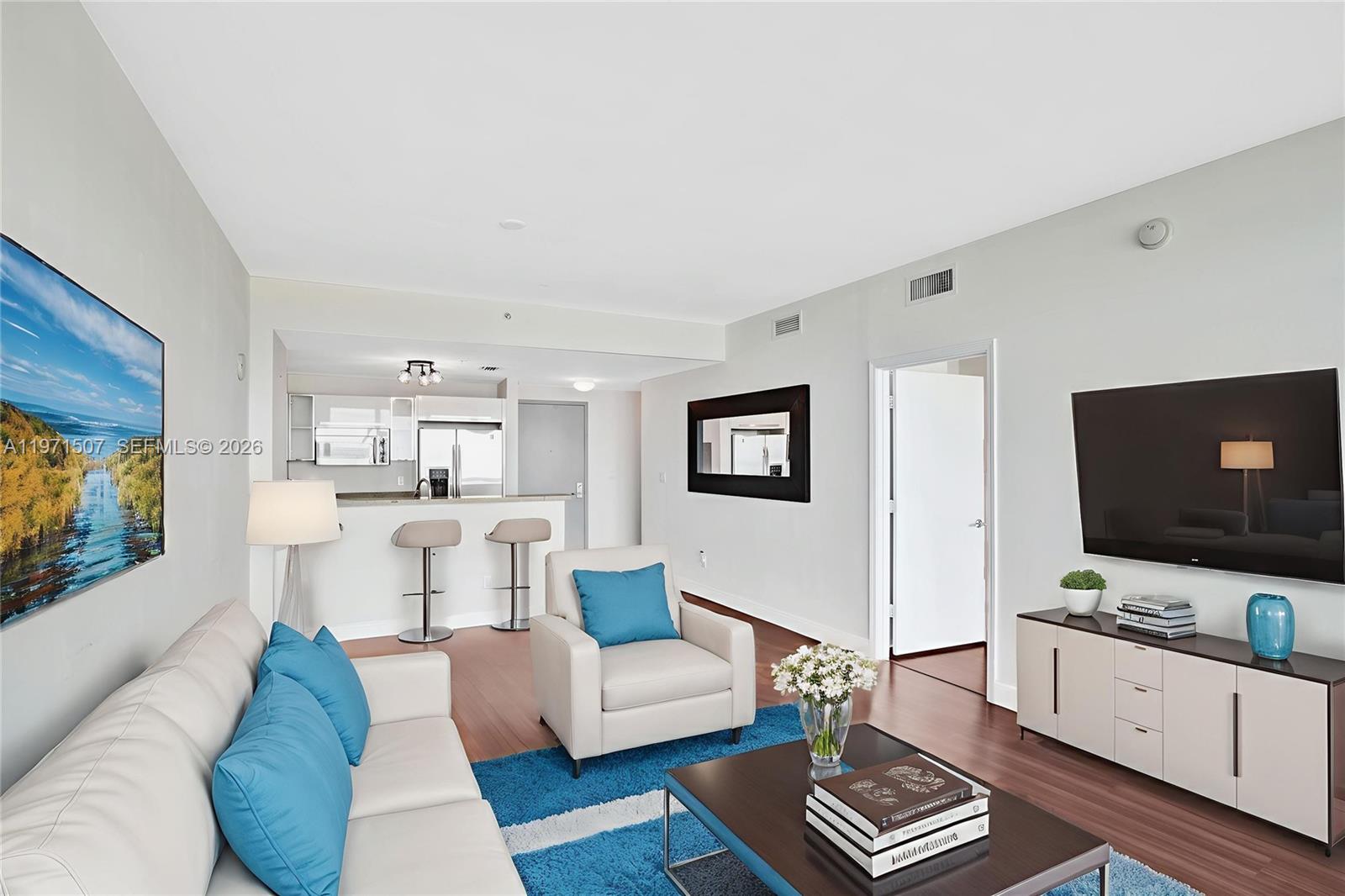 Great one bedroom condo in the Blue. The condo has one bedroom and one and a half bathroom. Full stacked washer and dryer inside the unit. The Blue has wonderful amenities such as a large pool deck with BBQ for you to use as well as a fantastic gymnasium and party room. Located at the bay with beautiful views and right of the Julia Tuttle Causeway with ease access to I-95 but also within minutes from Miami Beach and walking distance to the midtown night life.