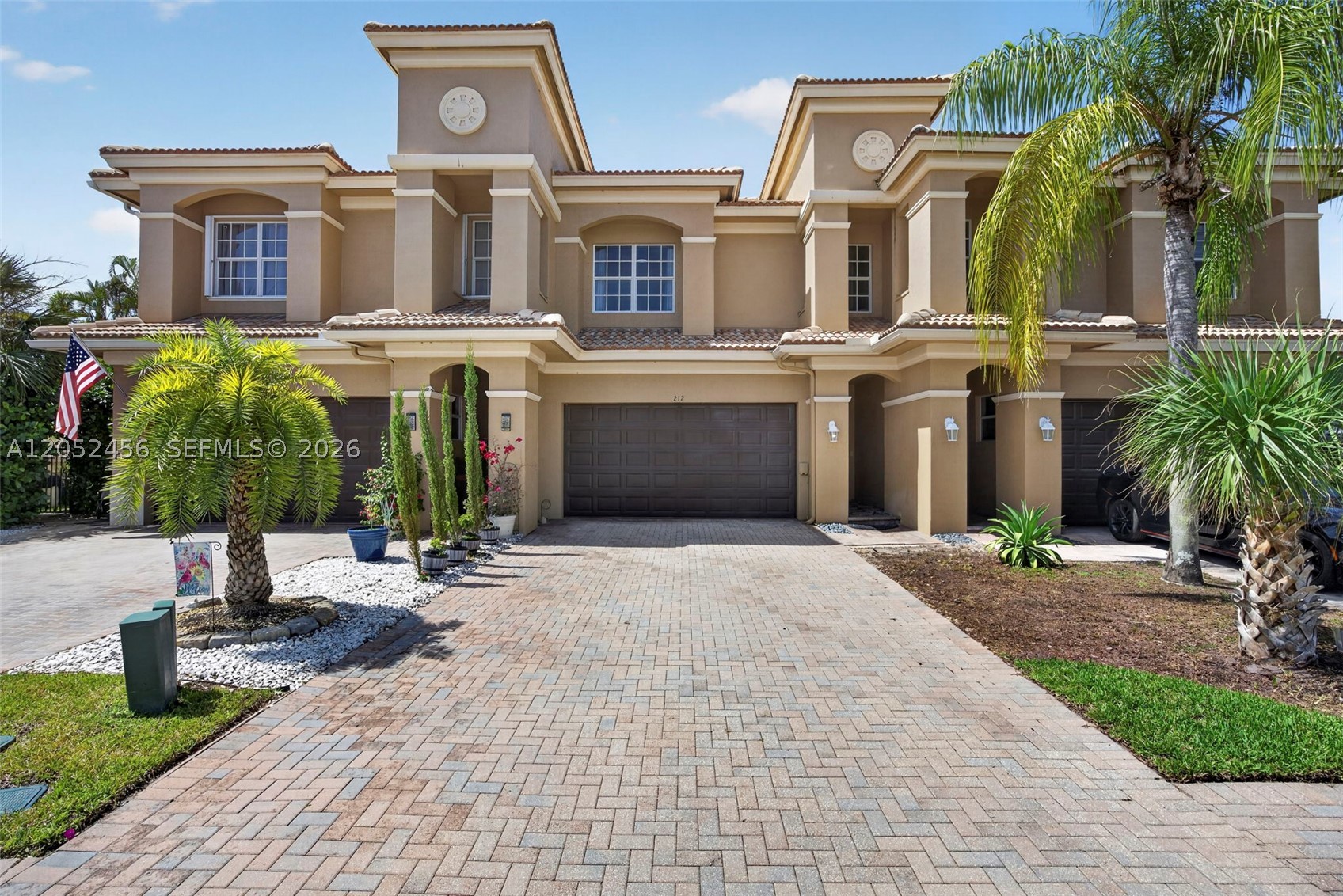 Rarely available and truly unique 3BR + loft, 2.5BA, 2-car garage townhome in the highly sought-after gated community of Bella Terra in Royal Palm Beach. One of only 6 townhomes among 390 single-family homes, this residence sits on an oversized 187’ x 25’ lot with a private covered patio and expansive deep yard—ideal for outdoor living, play, and entertaining. Features include an inviting floor plan, updated eat-in kitchen with white raised-panel cabinetry, Corian countertops, stainless steel appliances, pantry, and serving bar. The spacious primary suite offers a large walk-in closet and spa-inspired bath with dual-sink vanity, jetted Jacuzzi tub, and separate shower. Generous guest rooms, versatile loft/game room, contemporary tile and laminate wood flooring, soaring volume ceilings, grand skylight, and custom patio feature complete the home. Bella Terra offers resort-style amenities including a pool, clubhouse, tennis/pickleball, basketball, fitness center, playground, and walking paths. Conveniently located near major highways, shopping, dining, travel, nearby parks, and top-rated schools. Enjoy a desirable South Florida lifestyle in a gated community known for neighborhood appeal, outdoor recreation, and everyday convenience.