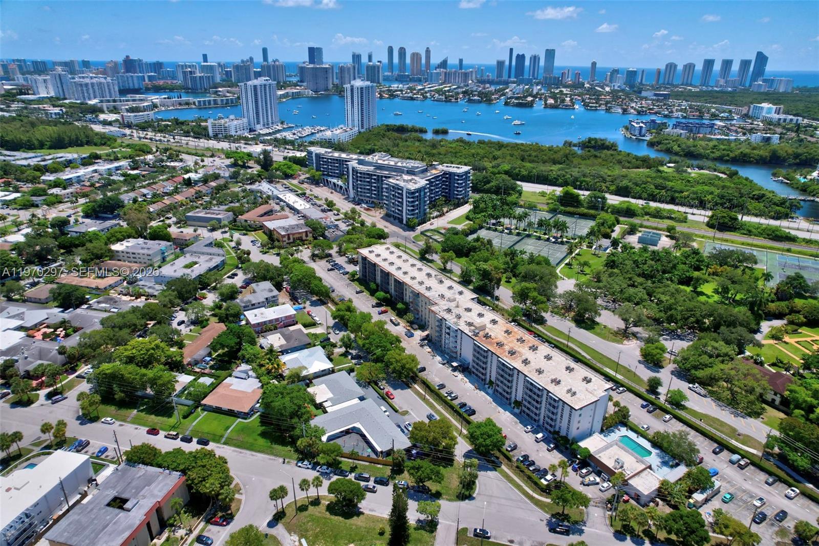 Income opportunity through rental with seller financing available: Enjoy a life of luxury and breathtaking sunset views from this exquisite condominium. Floor-to-ceiling windows and a private balcony seamlessly blend indoor and outdoor living. Inside, you will find a spacious one-bedroom, one-bath apartment with an open kitchen and a beautifully renovated bathroom featuring travertine tiles and a shower/tub. Gleaming hardwood floors enhance the interior, while a large walk-in closet with floor-to-ceiling windows elevates the bedroom space. The building offers amenities such as a furnished pool. Enjoy the ideal location, just steps from the NMB Tennis Center, the Old Spanish Monastery, and only a 5-minute drive to the beach. With on-site laundry and a gated environment, this is a place to call home. The Homeowners Association requires a credit score of 650.