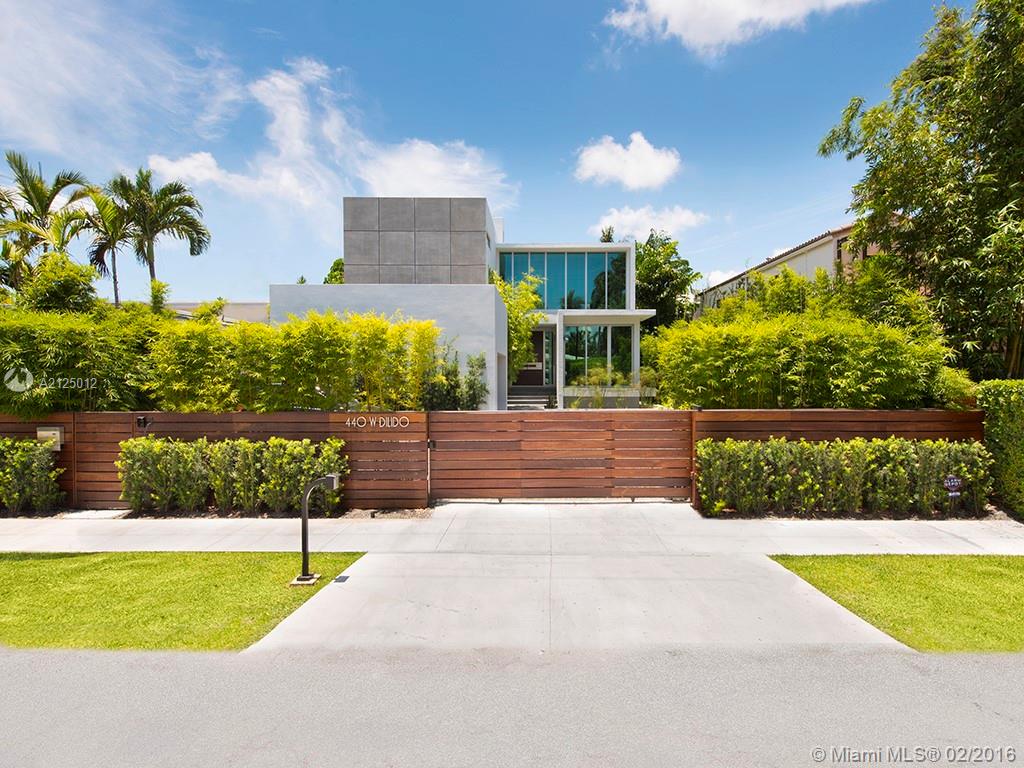 This gorgeous 6 bed 7.5 bath modern home set on the highly sought after Venetian Islands is truly a tropical oasis in the heart of Miami Beach. Features include contemporary architectural design, spacious open floor plan, white oak flooring throughout, cu stom Officine Gullo professional chef's kitchen and stunning master suite with adjoining office. Enjoy the sunsets every night from a 1600 sf rooftop deck with views of Downtown Miami. Professionally designed, this home is completely one of a kind.