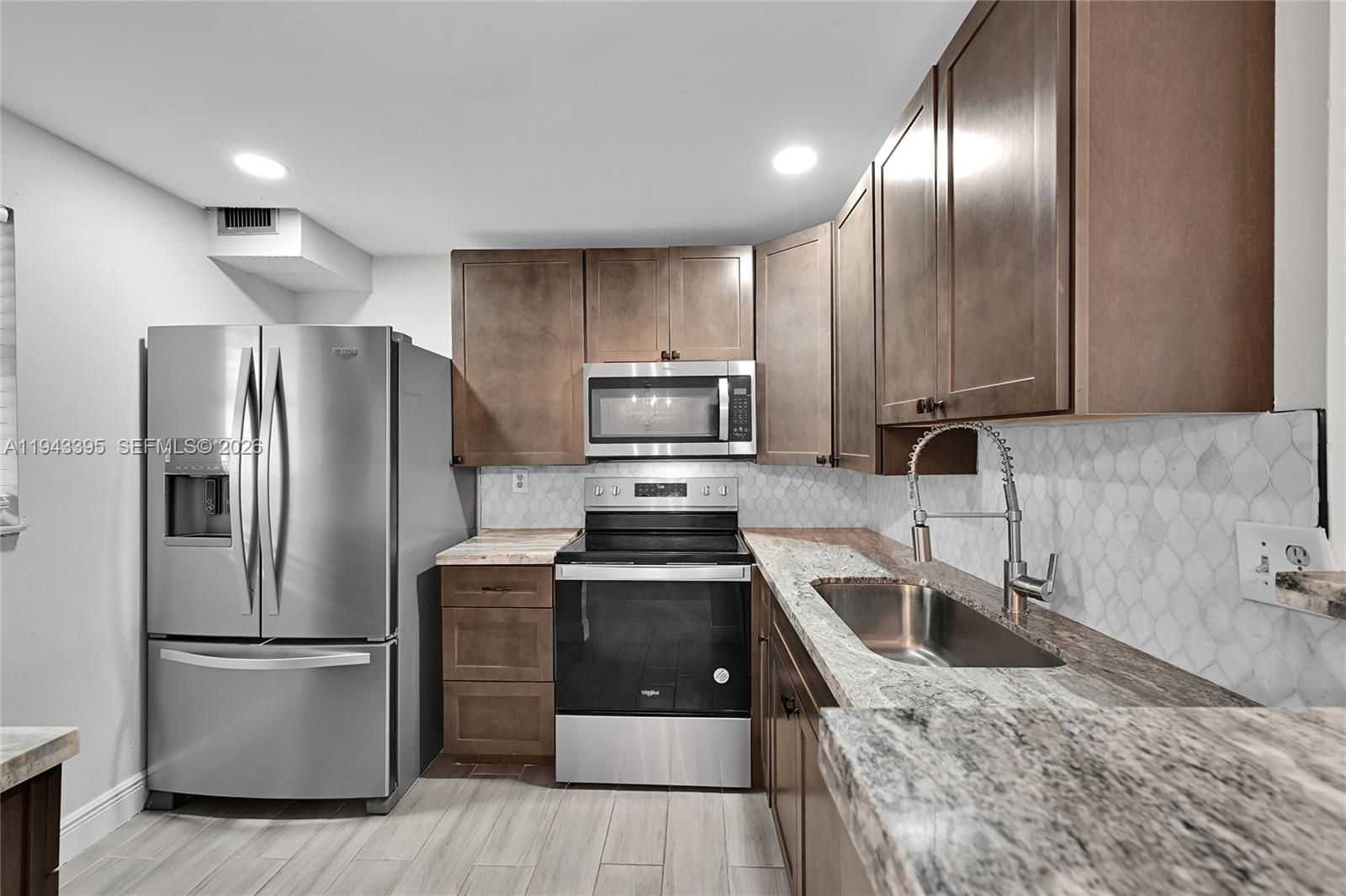 ***PRICE IMPROVEMENT FOR QUICK SALE*** Impeccably maintained 1-bedroom, 1-bath residence located in the desirable Somerset at Lauderdale Lakes. This inviting unit features ample walk-in closet space, a beautifully remodeled bathroom, and generous storage throughout. The upgraded kitchen offers a rare open-concept design, combining convenience and modern style. Enjoy relaxing sunset views from the screened balcony. The community offers 24-hour gated security and is designated for 55+ residents. Ideally located close to transportation and just minutes from area beaches, shopping, and dining.