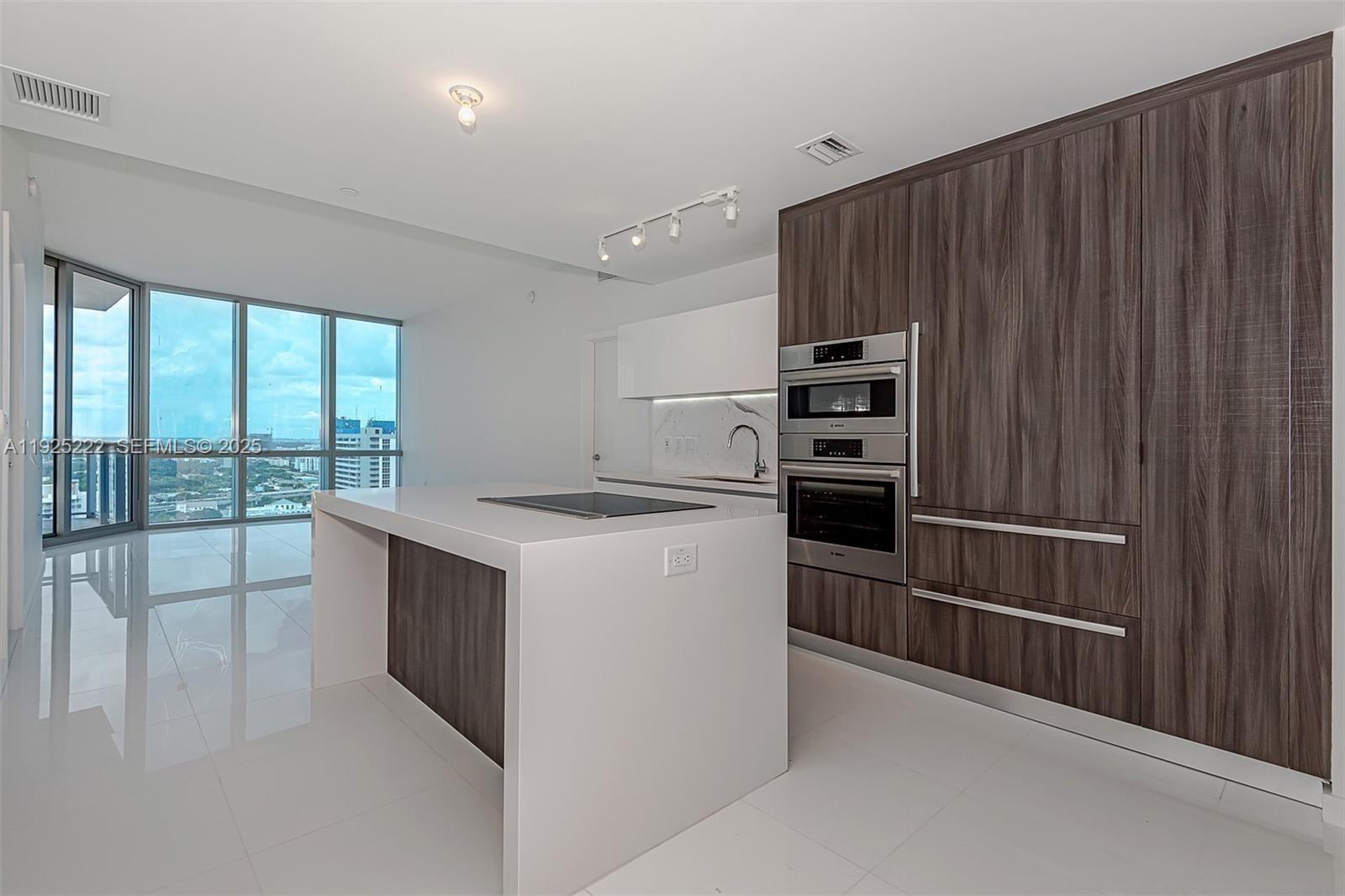 Luxury 2 Bed + Den /3 bath at the Miami World Center, the building with the most amenities in the city! Extra high floor to ceiling windows with huge terrace. This building has the best amenities in the area: Basketball Half-Court, Racquetball Court, Relaxation Areas: Conservatory, Relaxation Lounge, Spa/Salon, Movie Theater, Indoor Sports Center (State-of-the-art Fitness Center, Boxing Studio, and Aerobics Area), Entertainment Center, 24 hour food market, etc. Can be rented seasonally! Seller financing available.