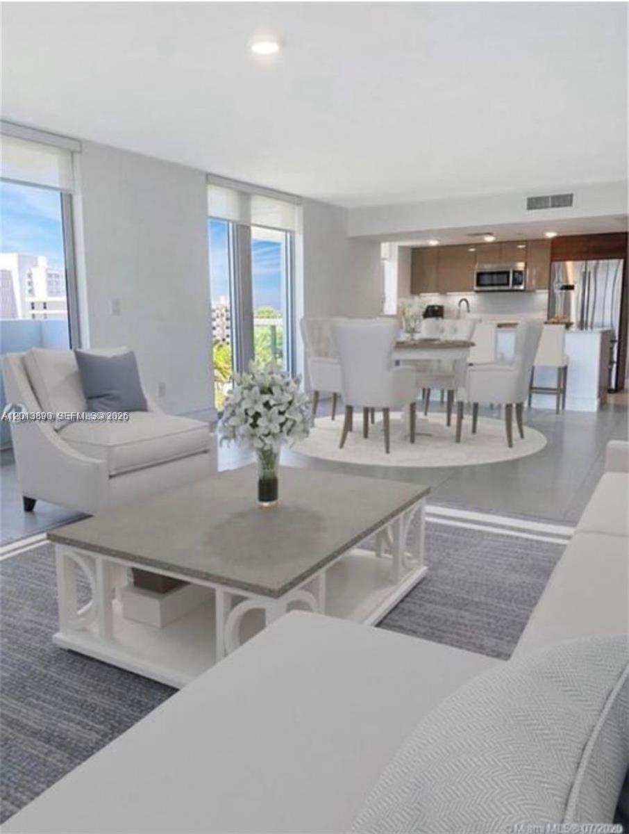 Live in this moat remarkable spacious , bright, 2bd plus den , corner unit with direct canal views and some Atlantic Ocean . This 1958 sq ft unit , boast space and  light. It is a pleasure to live in , the rooms are very big and the den makes for a 3rd bedroom. This new boutique building in prestigious Bay Harbor Island offers the joy of living in walking distance to the great Ruth K Broad K-8 , a rate A school.  It is walking distance to restaurants, the soul, and Bal Harbor shops. The amazing rooftop pool and jacuzzi have breathtaking views. Easy to show !! Call or text listing agent .