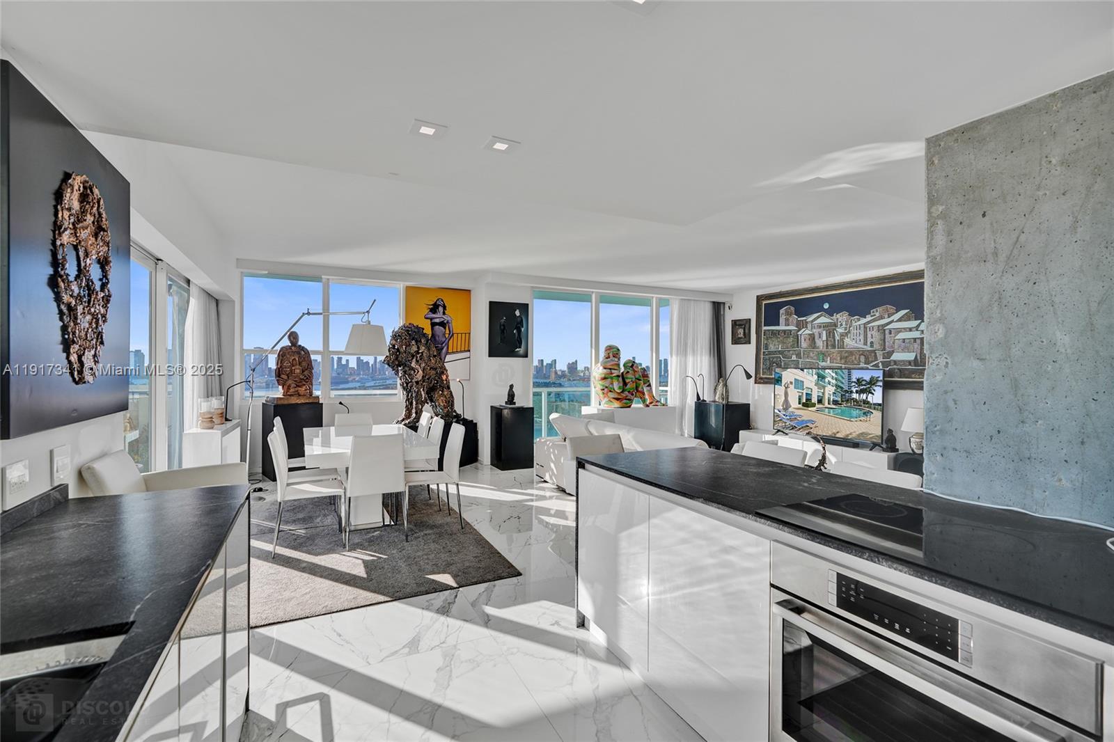 Rare penthouse opportunity in The Floridian’s signature rooftop-terrace line — one of only 4 with a terrace over 1,100 sq ft and one of only 2 with direct bay exposure. Uninterrupted bay and skyline views, spectacular sunsets, seamless indoor/outdoor flow, designer finishes and impact windows. Your 1,100+ sq ft terrace functions as an outdoor living room, dining area and lounge above the city — a true entertainer’s canvas. Located in one of Miami Beach’s most coveted pockets: walk to Whole Foods, South of Fifth, South Pointe Park and the forthcoming pedestrian bridge linking West Ave to the Baywalk (est. 2026). Resort-style amenities include dual bayfront pools, tennis, spa, yoga & Pilates studio, full cardio/weight suite, BBQ terraces, valet and a 24-hour attended lobby.