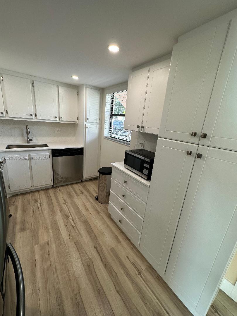 SUZANNE GARDEN APTS CONDO - Residential Lease