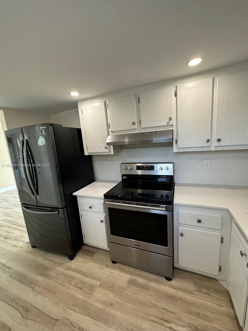 SUZANNE GARDEN APTS CONDO - Residential Lease