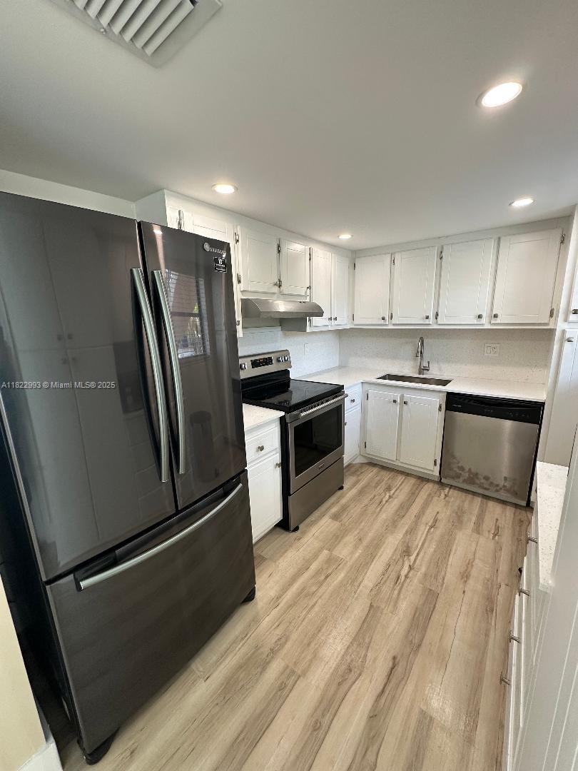 SUZANNE GARDEN APTS CONDO - Residential Lease