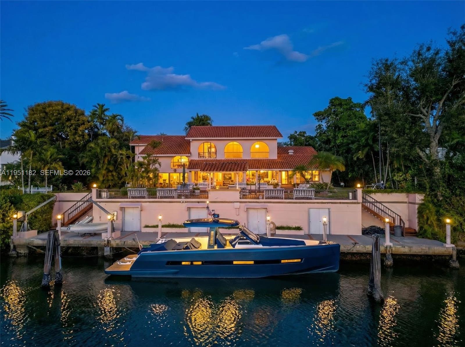 Opportunity awaits. Offered for the first time since 1993, this well-maintained waterfront home, set on a generous 22,154 SF lot with 116 feet of prime water frontage on the Coral Gables Yacht Basin Waterway. The property features a private dock with water and electricity and just one (high) bridge to Biscayne Bay, inviting effortless boating, paddleboarding, and waterfront living. The existing 5 Bedroom 5.5 Bathroom + Den residence offers a functional layout, ideal for renovation or as a prime opportunity to maximize the lot and create a custom waterfront estate. A rare chance to enjoy tranquil water views, direct access, and the ultimate South Florida lifestyle. Whole-house generator and 2-car garage.