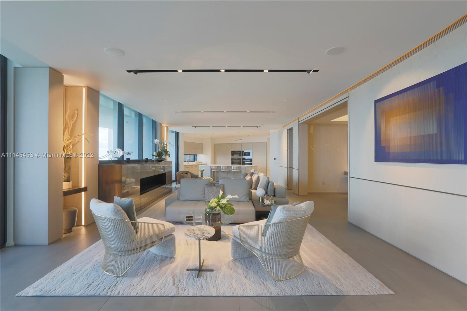 Elegant luxury meets impeccable interiors in this spacious Porsche Design Tower residence that features nearly 6,000 square feet and stunning ocean views.

Nestled on Sunny Isles Beach, Residence 2501 boasts three large bedrooms, three and a half bathrooms, a formal dining room, a large den with built in office, gourmet Poggenpohl kitchen with dining area, fireplace, 2-car private garage, in-balcony pool, summer kitchen and more.  

Designed by renowned firm, Wecselman Design, this warm and inviting home offers extensive custom millwork by DeA Italiana, Mosa flooring, Sonos built in speaker system, custom doors with Olivari handles, stunning marble baths and spacious designer closets.

No detail spared in this Tower where a glass-enclosed car elevator acts as its centrepiece.