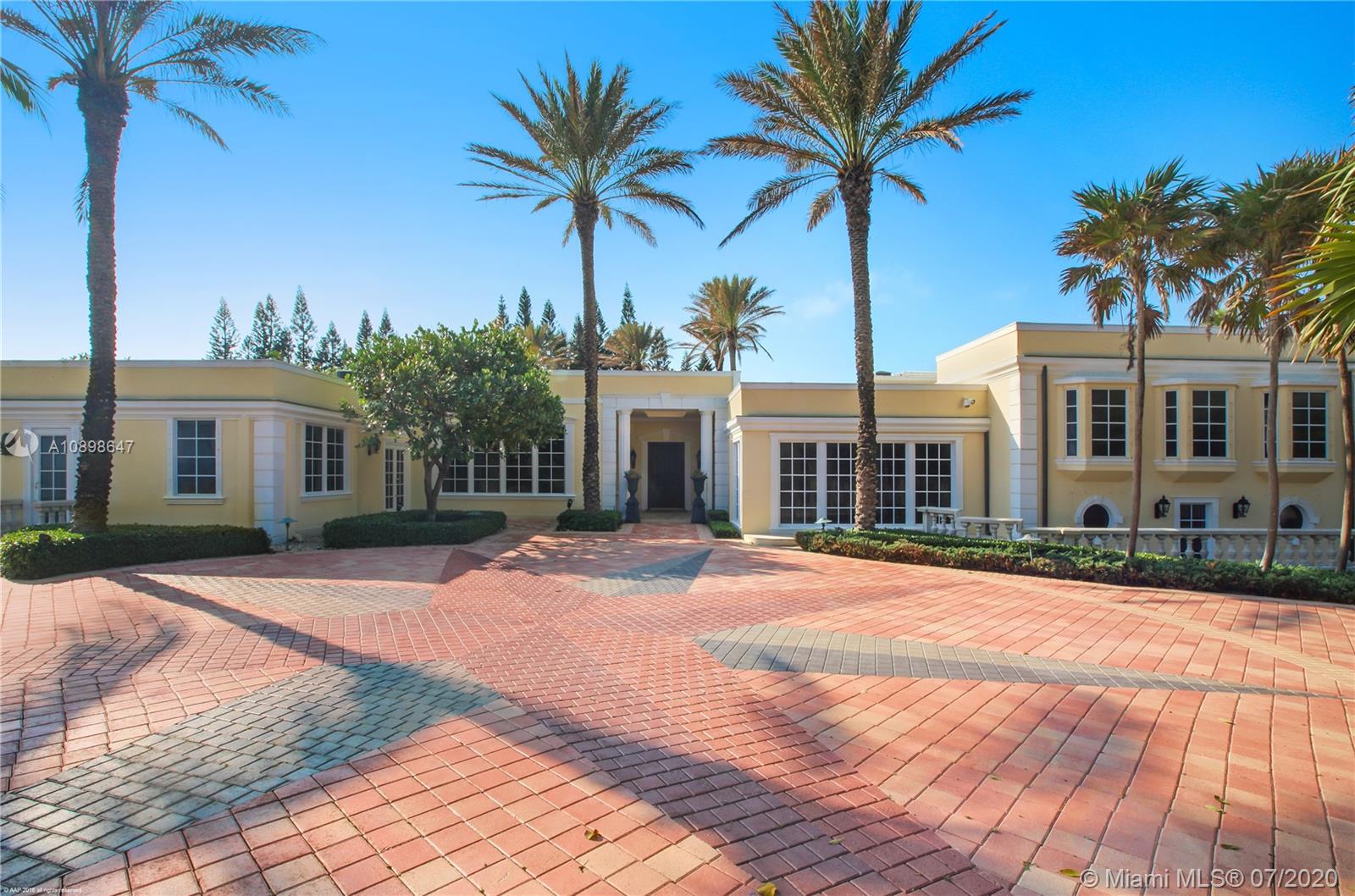 This Jupiter Island oceanfront estate perfectly displays the epitome of timeless elegance! No detail was left untouched by master craftsmen featuring top quality fixtures and finishes throughout its nearly 10,000 square feet of living space. Outside, the gated and impeccably landscaped 2.5 acres presents breathtaking, unobstructed ocean vistas from its high elevation. Spanning and impressive 221+/- feet of direct beachfront, this is truly a magnificent property to behold.
