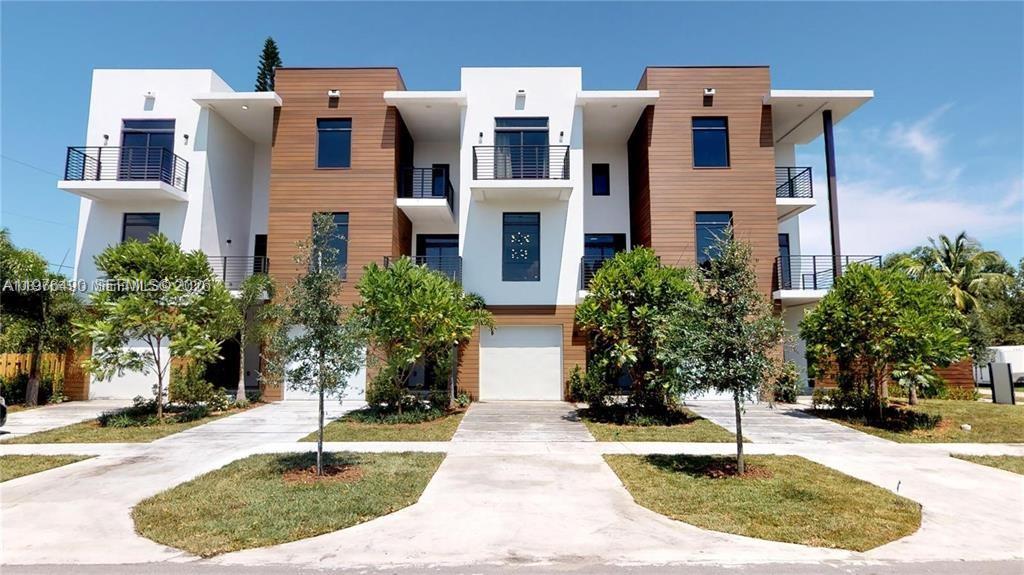 Income-producing opportunity in the heart of Hollywood. This 2020 newer construction 4-plex offers four spacious townhomes, each thoughtfully designed to attract strong, stable tenants. Every unit features 3 bedrooms and 3.5 bathrooms, along with a private 1-car garage. Interiors include custom kitchens with stainless steel appliances, wood flooring throughout, full-size washer and dryer, and en-suite bedrooms with generous walk-in closets. Located just east of US-1 and minutes from shops, Downtown Hollywood, and the beaches, this property combines modern comfort with unbeatable convenience. All units are currently leased, allowing investors to step into immediate cash flow with a high-quality, low-maintenance asset. **PLEASE NOTE THESE UNITS ARE 4 SEPERATE FOLIOS BEING SOLD AS BUNDLE** NO ASSOCIATION.